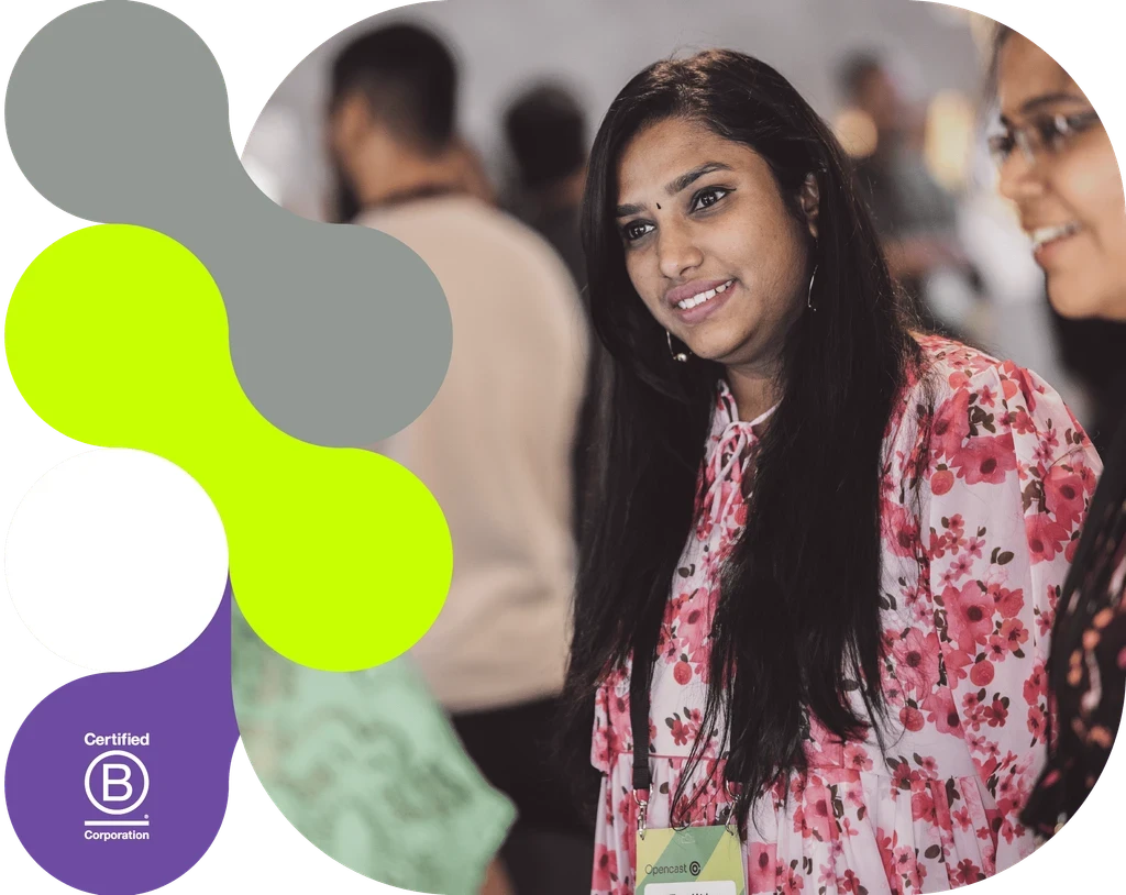 Photo of opencast team member in conversation at a opencast conference