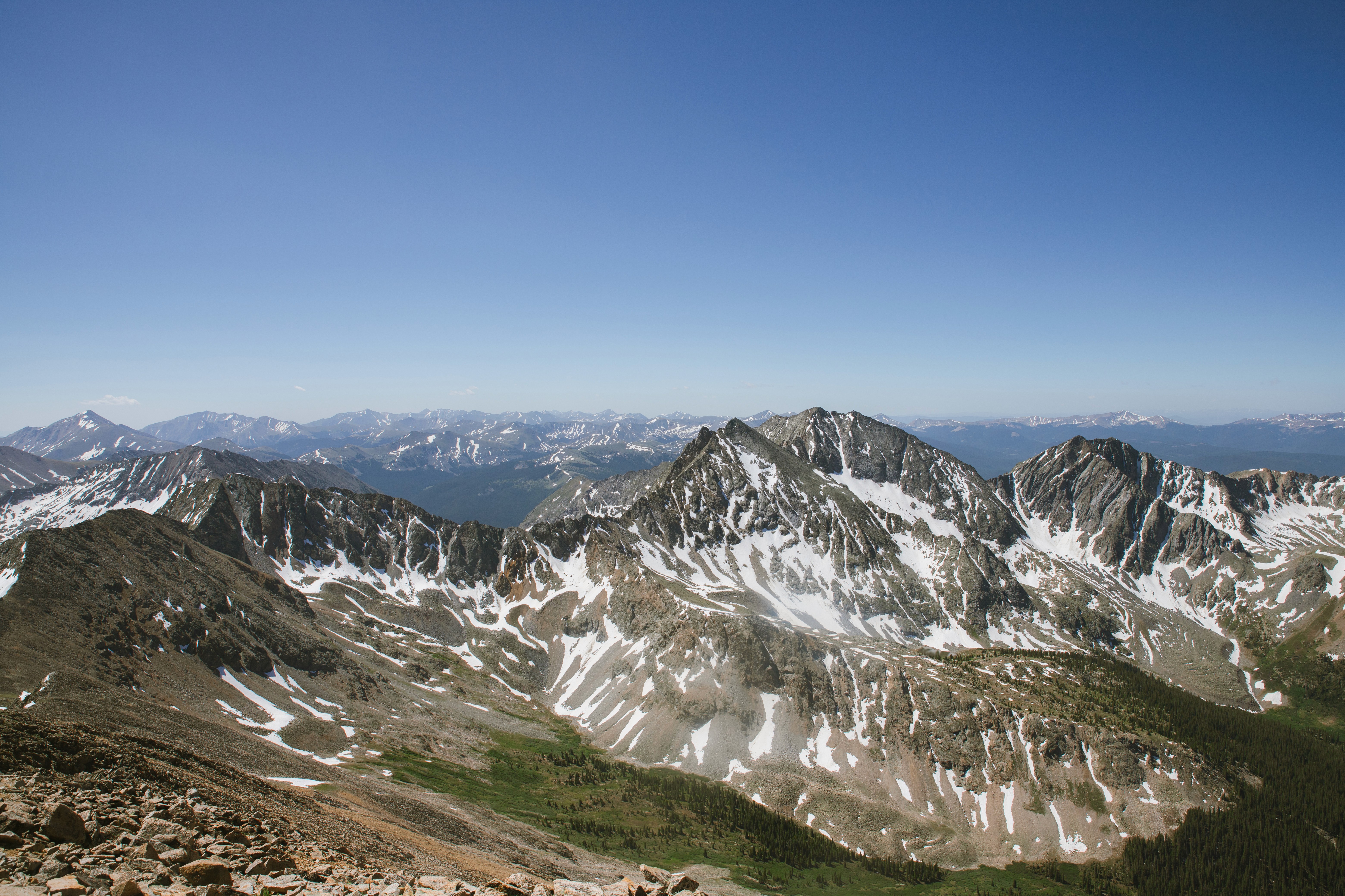 Streetside billboard with flyposters of the Batch.Works brand and illustrations