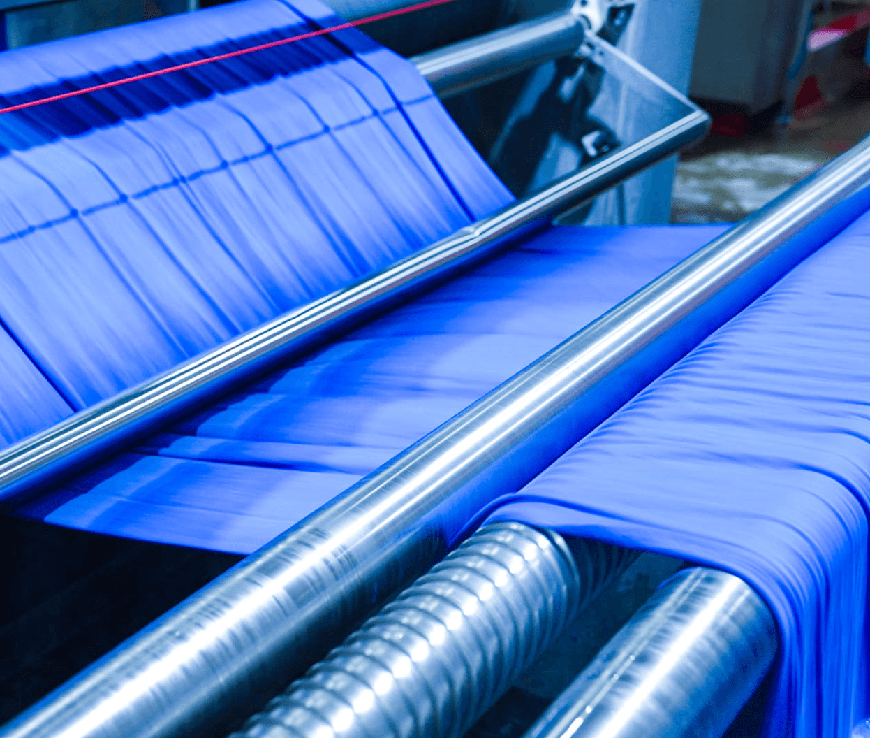 Blue fabric on rollers