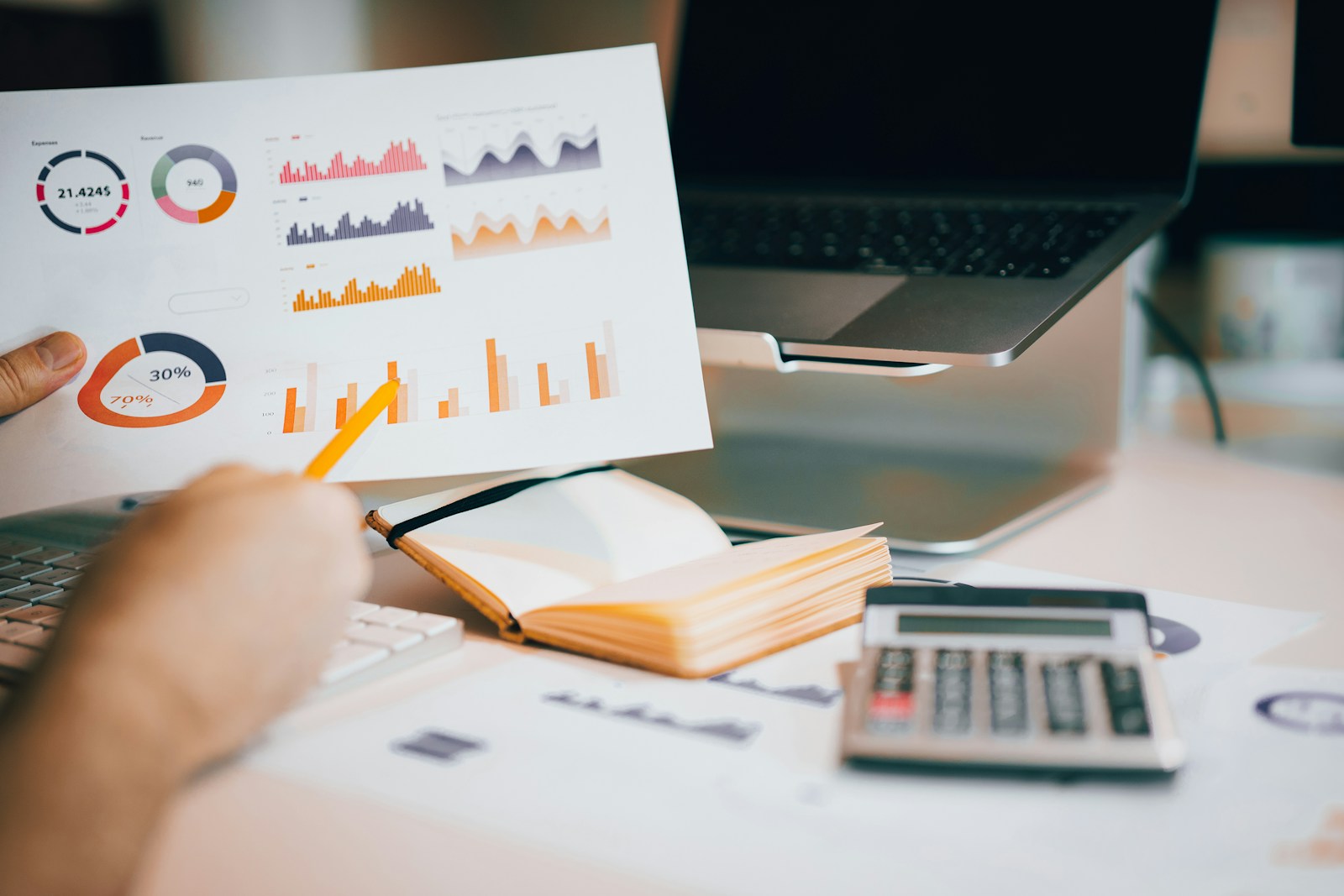 Marketing performance data reviewed at a desk