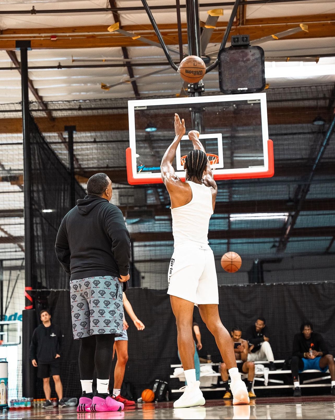 Olin Simplis teaching free throws