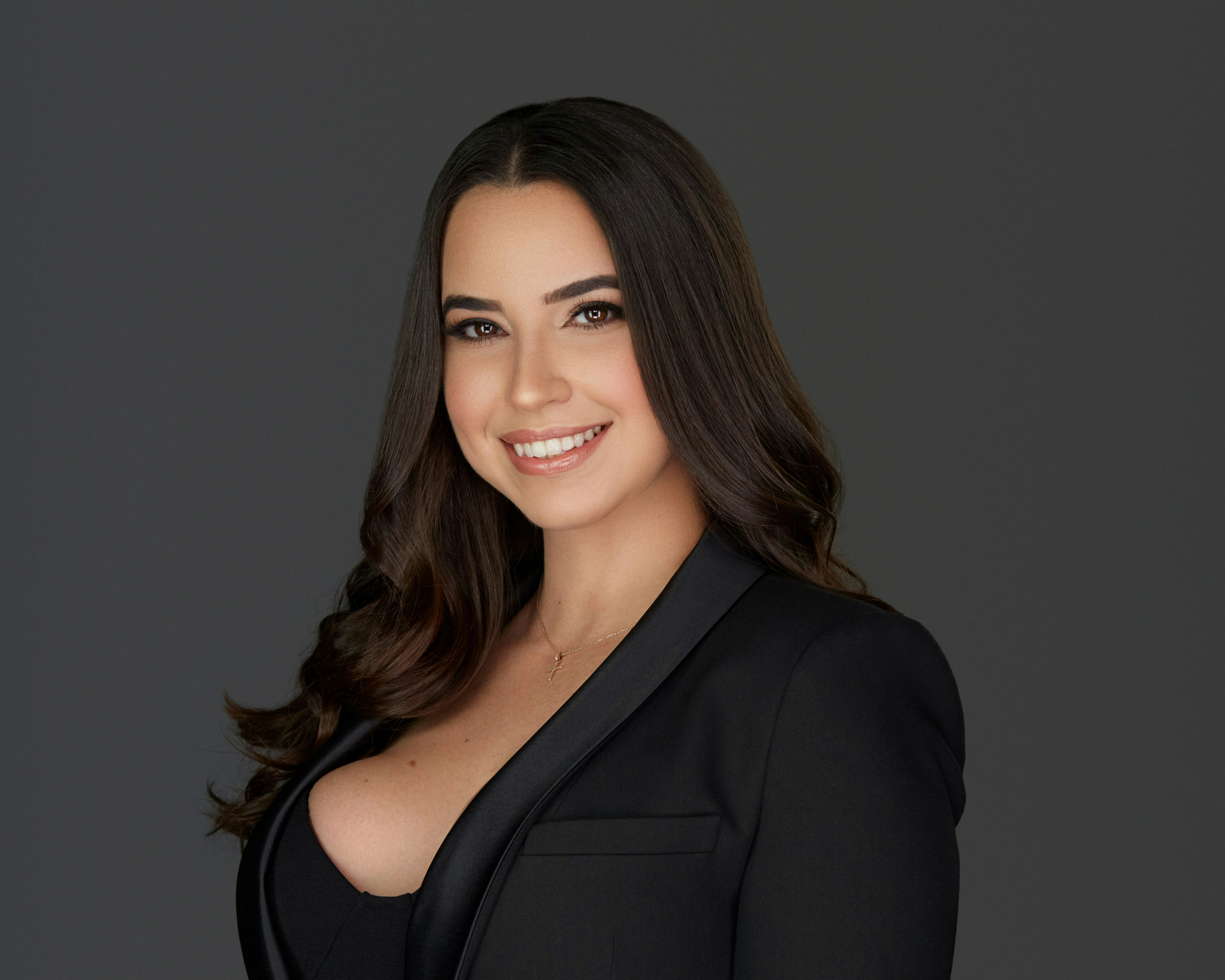 woman in black long sleeve shirt smiling