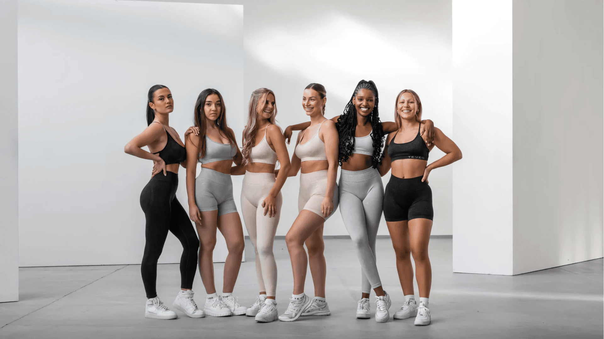 A group of women modeling Teveo gym wear