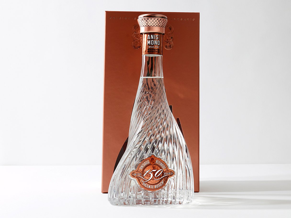 Rooftops of a coastal town with the sea in background