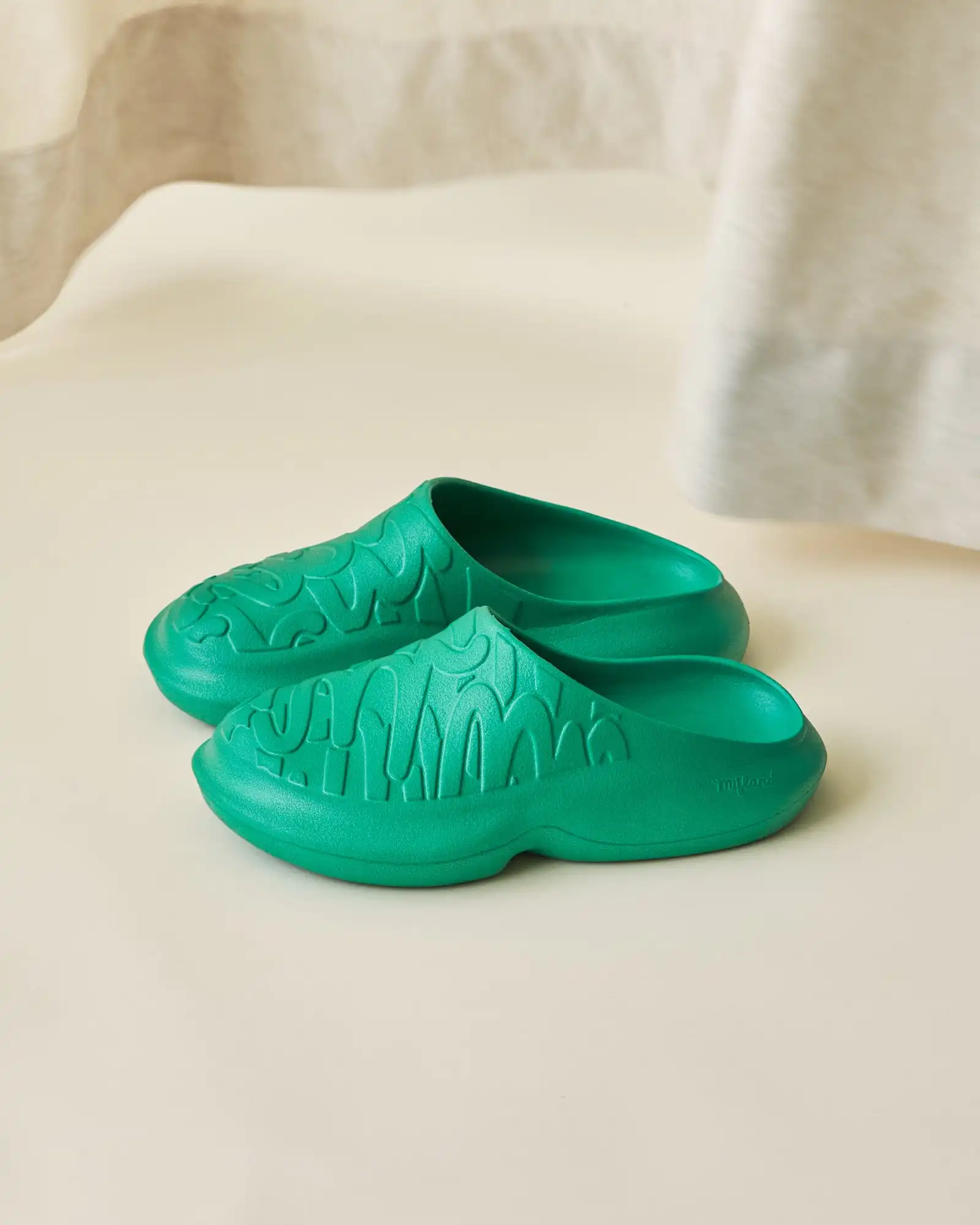 Yellow bowl filled with lemons on bright yellow background for lifestyle branding