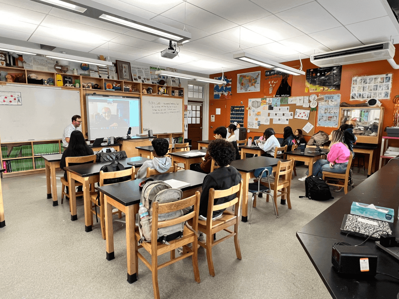 High school student conducting biology research in a university laboratory setting, representing top biology research programs for US students in 2026