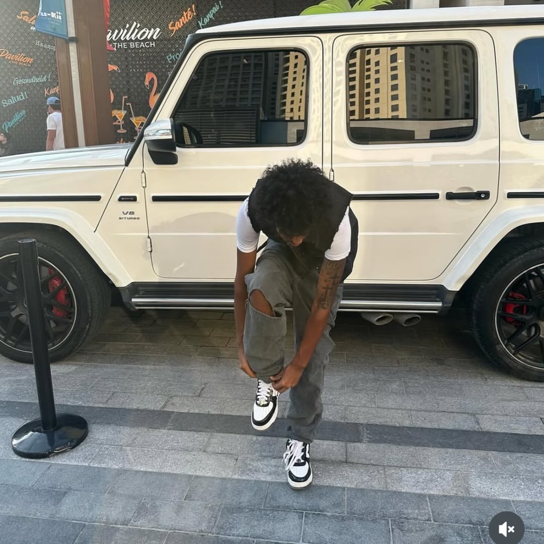 Image of a rapper with headphones