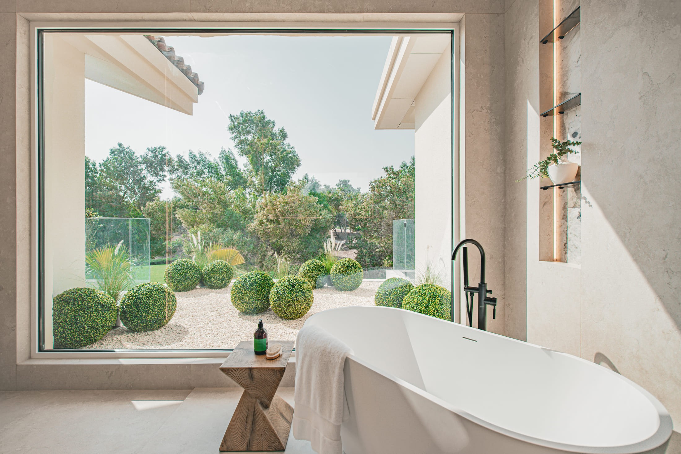 Image of a large villa with big glass windows