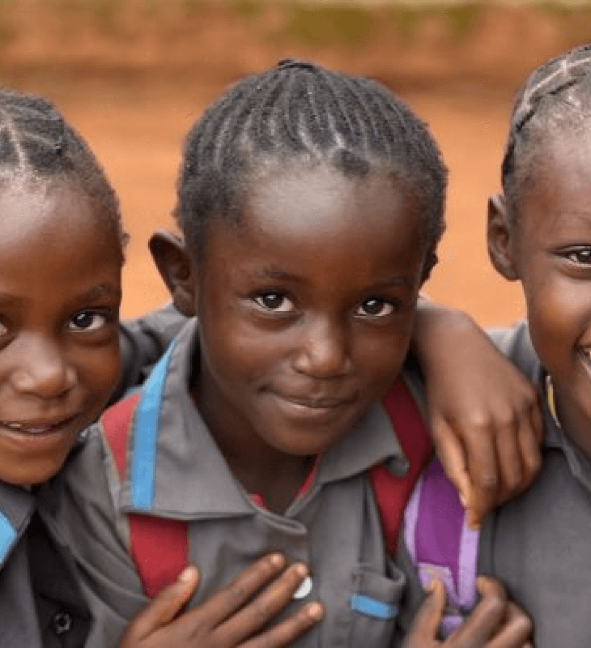 Young child smiling — Osmow's Hope Fund feeding children in developing nations