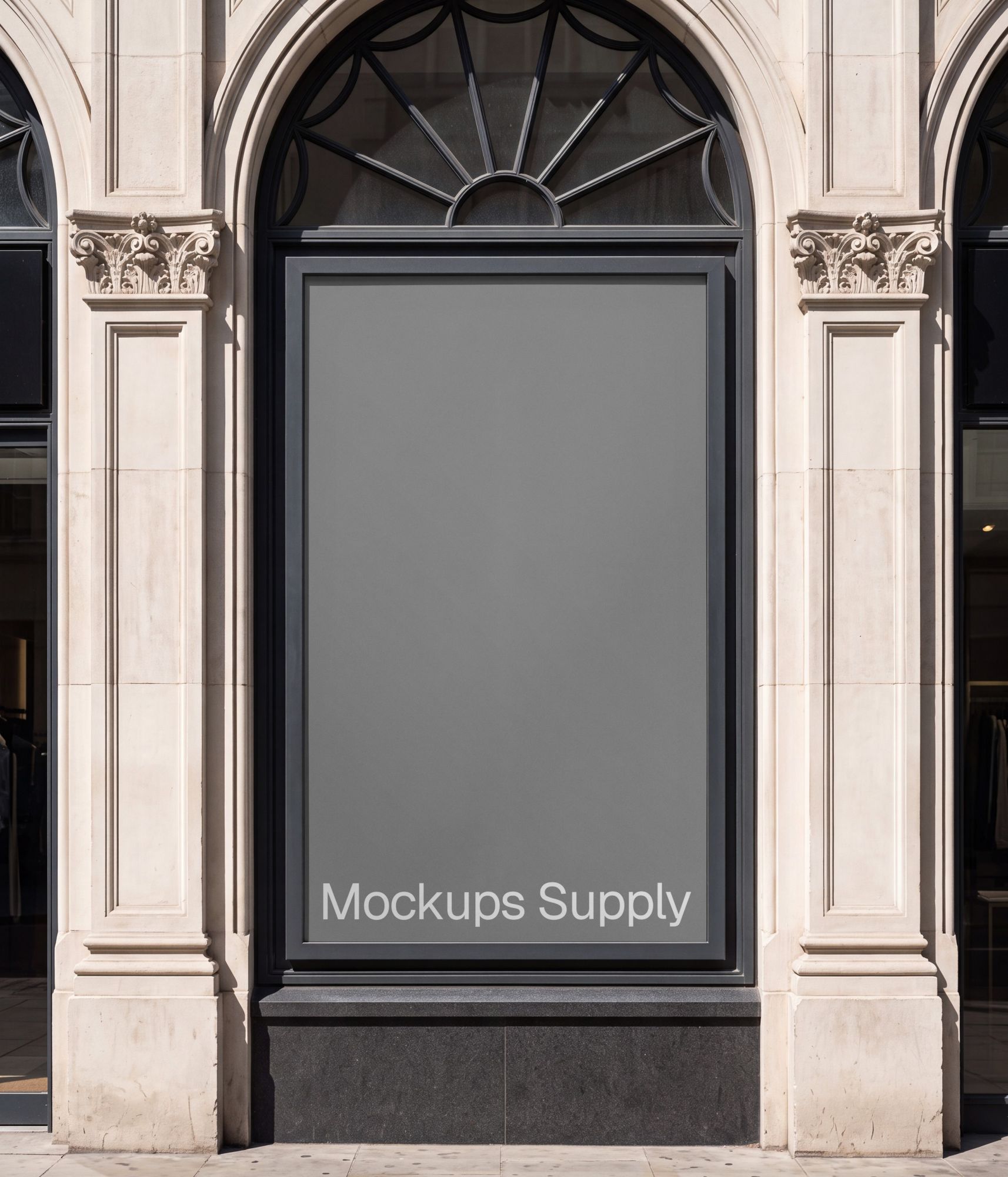 Elegant poster mockup displayed on a historic facade PSD download