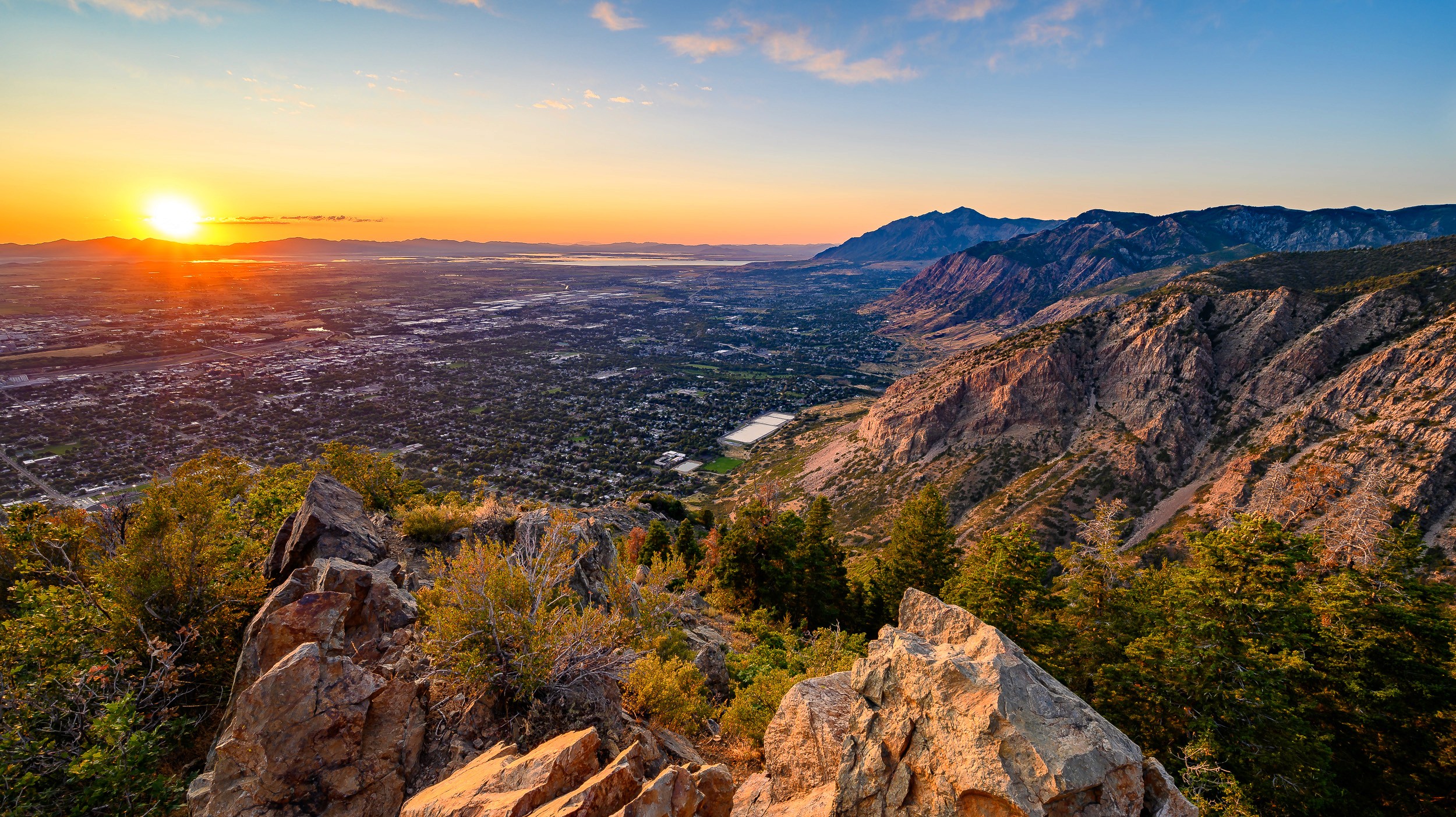 View from Malan's Peak in Ogden Utah showing the summer sun setting