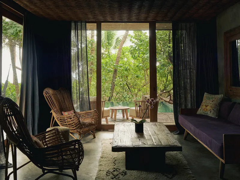 Premier Suite at Be Tulum featuring private pool, terrace seating, and lush green views.