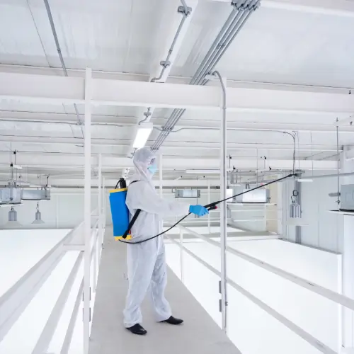 high dusting service in a warehouse using aerial lift equipment