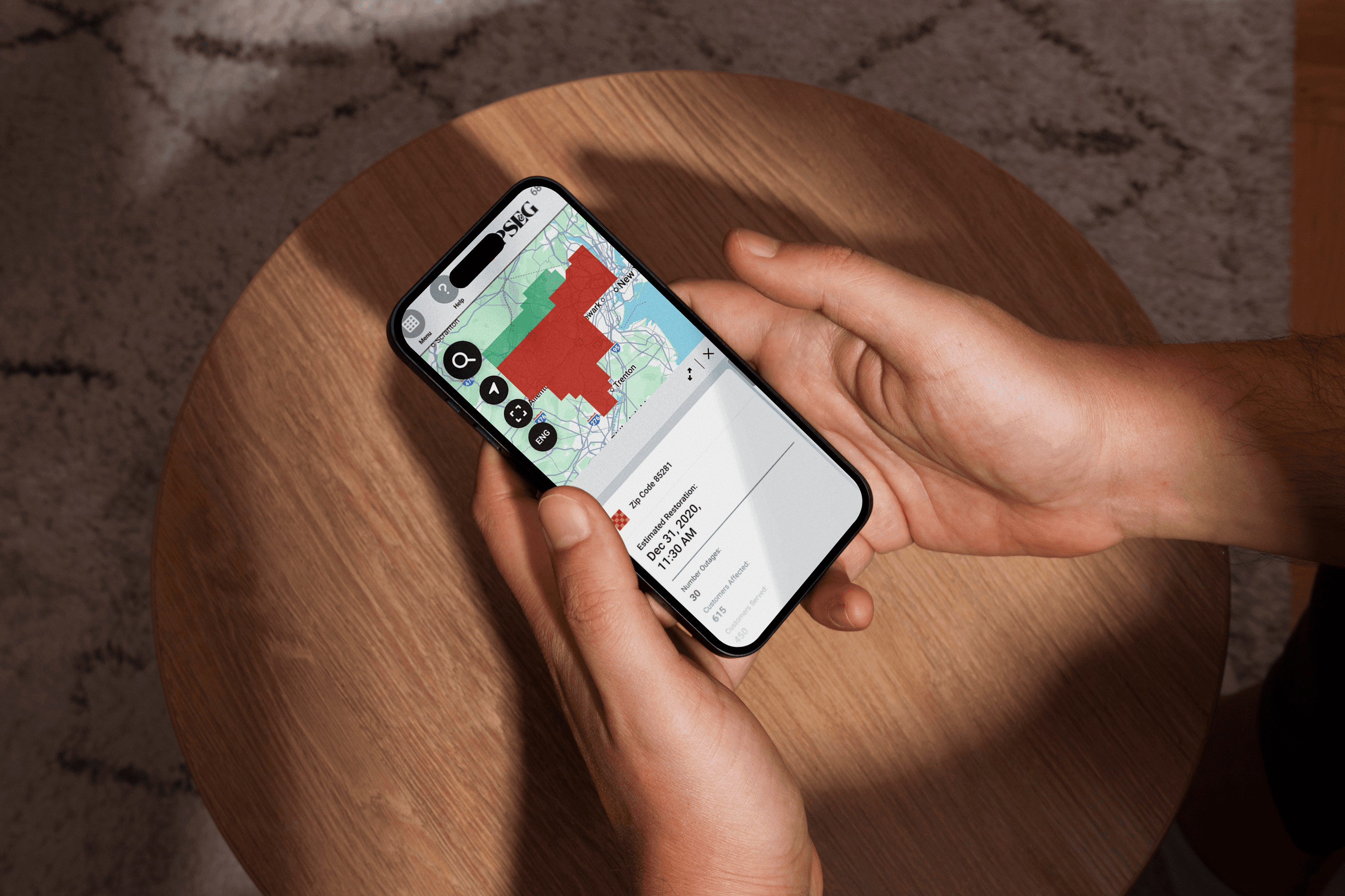 image of a smartphone leaning on top of a record player