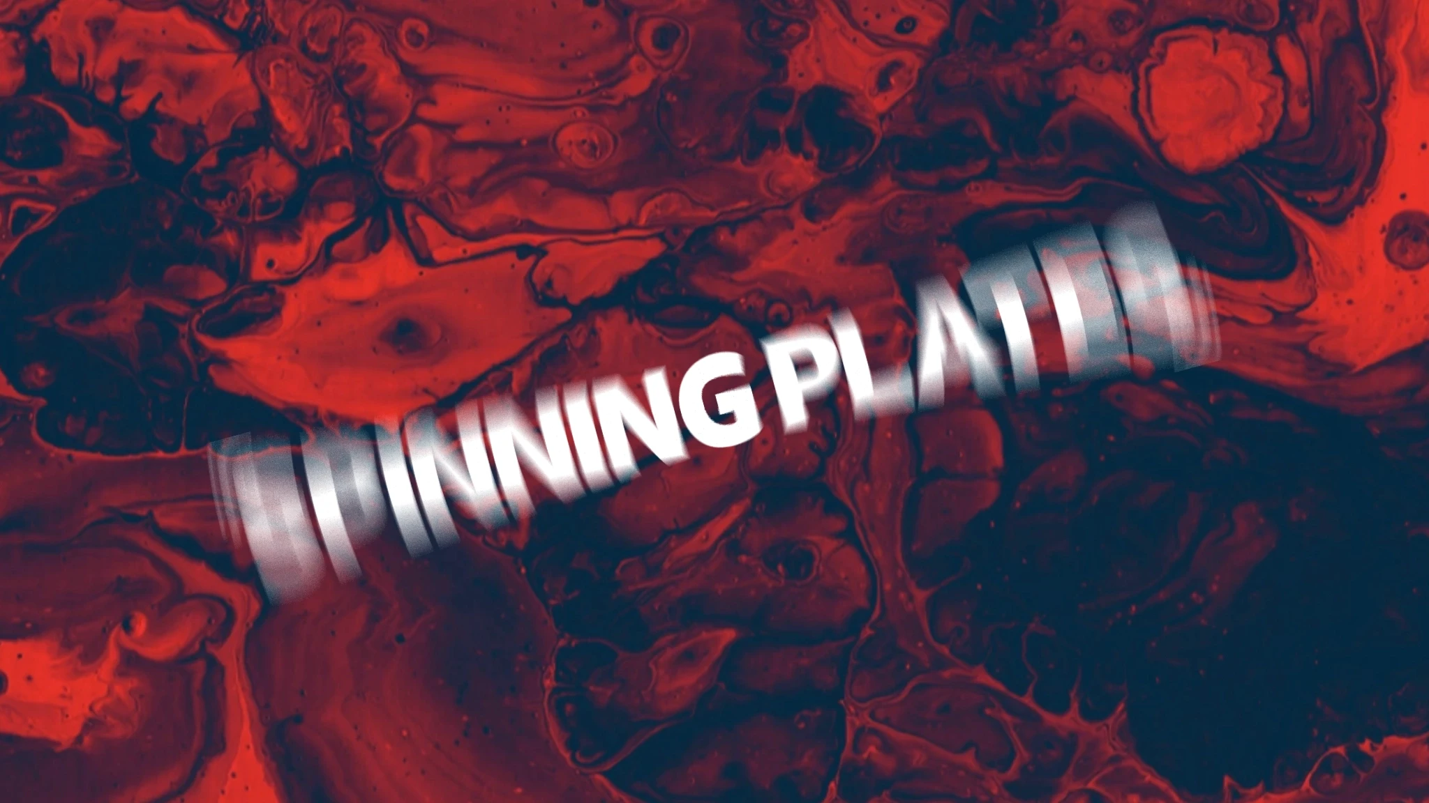 Spinning Plates lockup against red and blue paint.