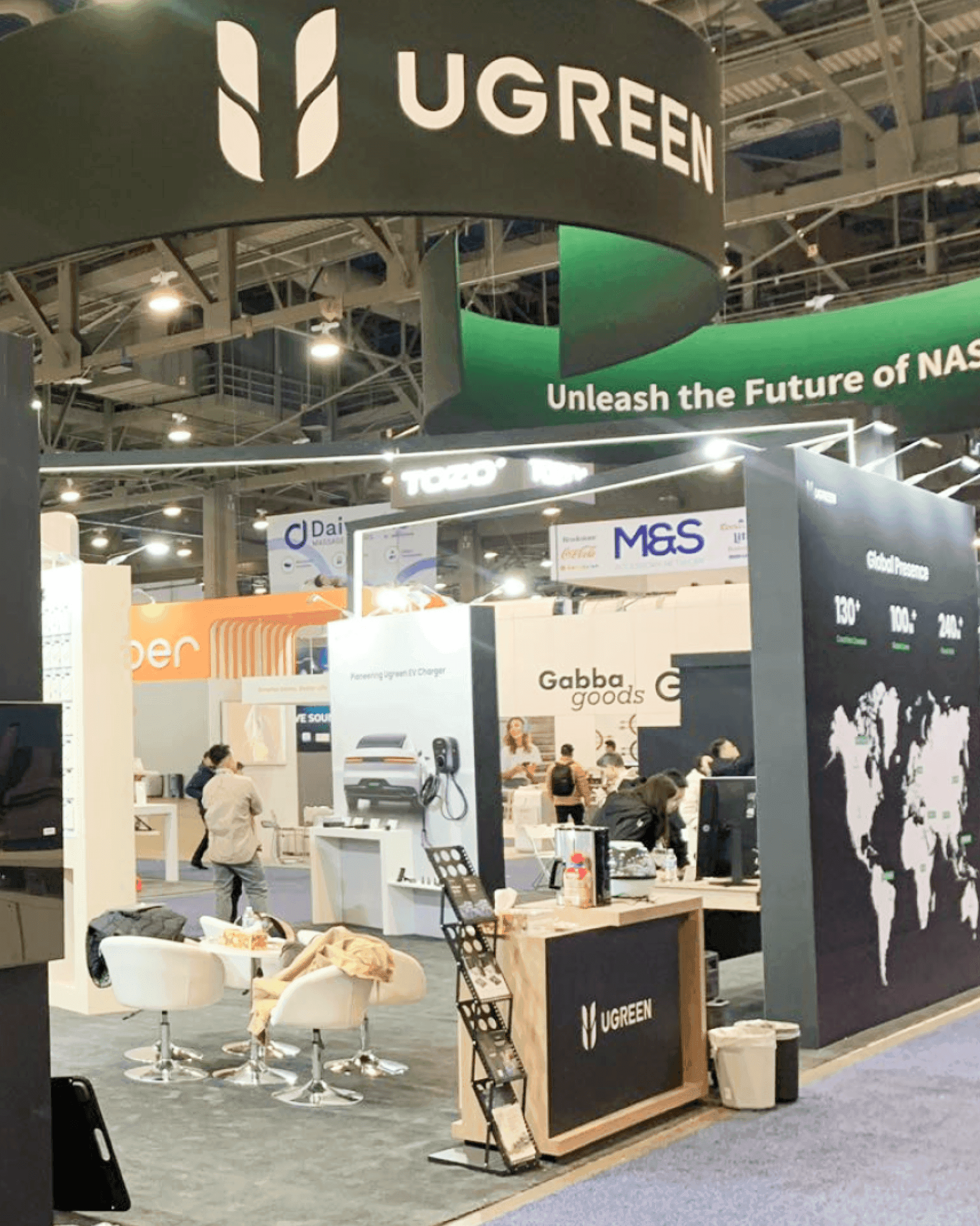 20x30 CES trade show booth overview with separated demo area, branded wall, and conversation space