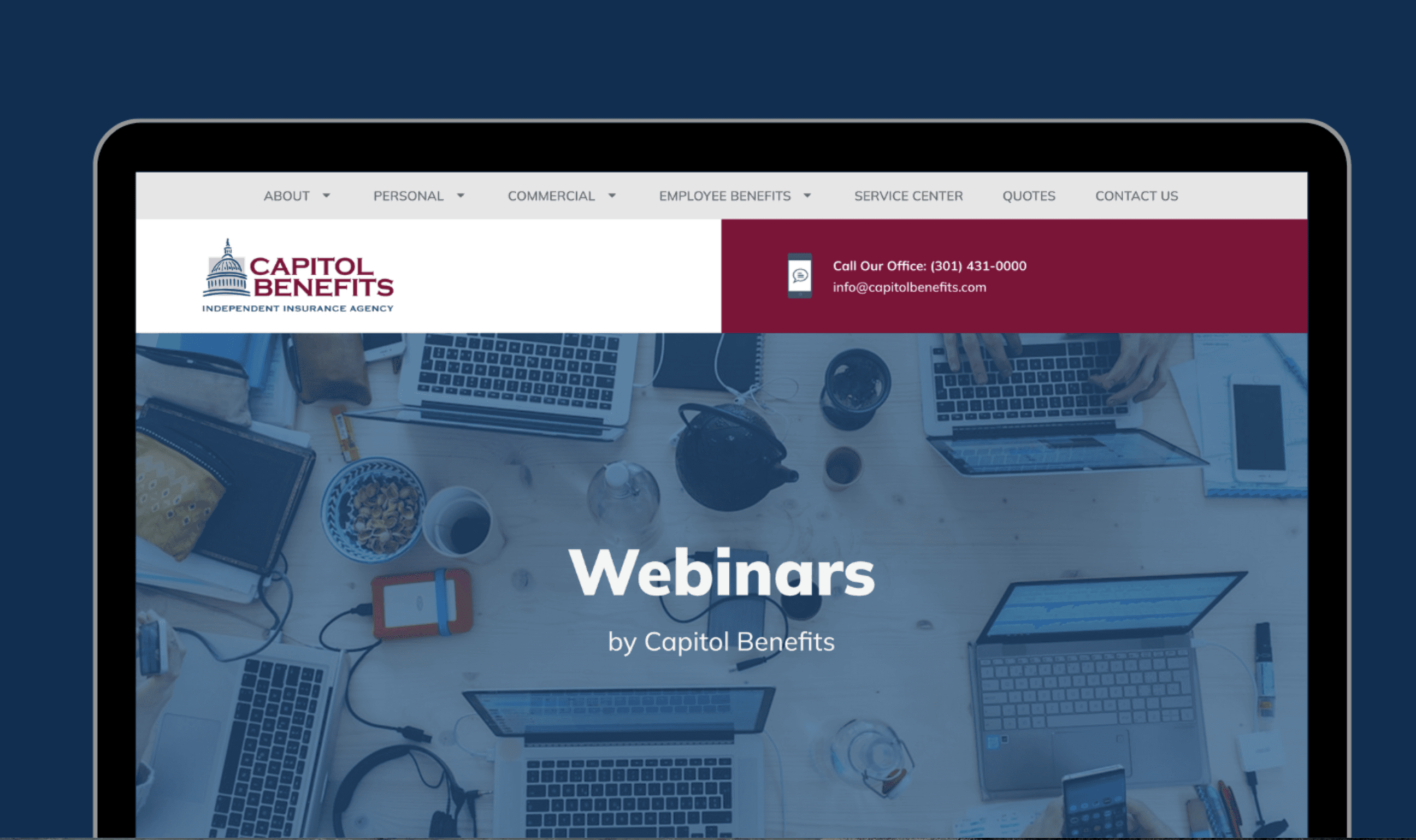 Palm trees frame a dramatic mountain valley landscape