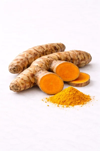 isolated TURMERIC RHIZOME root on a white background.