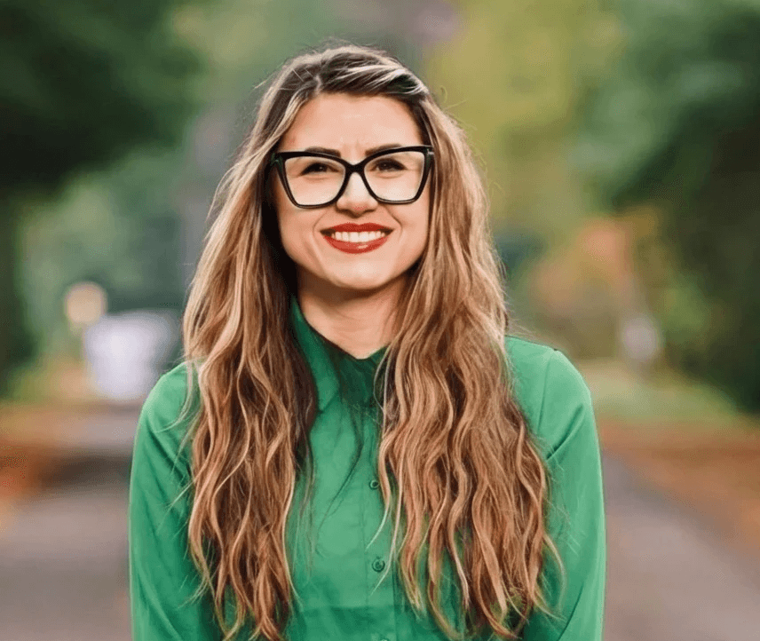 man in white crew neck shirt wearing black framed eyeglasses