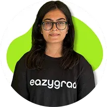 A person with glasses wearing a black shirt stands against a green and white circular background.