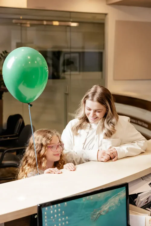 Mother and Daughter being greeted at ScarboroSmiles: : Best dentist in Scarborough, Ontario