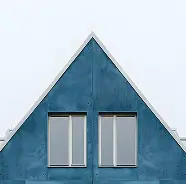 Blue triangular house top with two rectangular windows on a white background