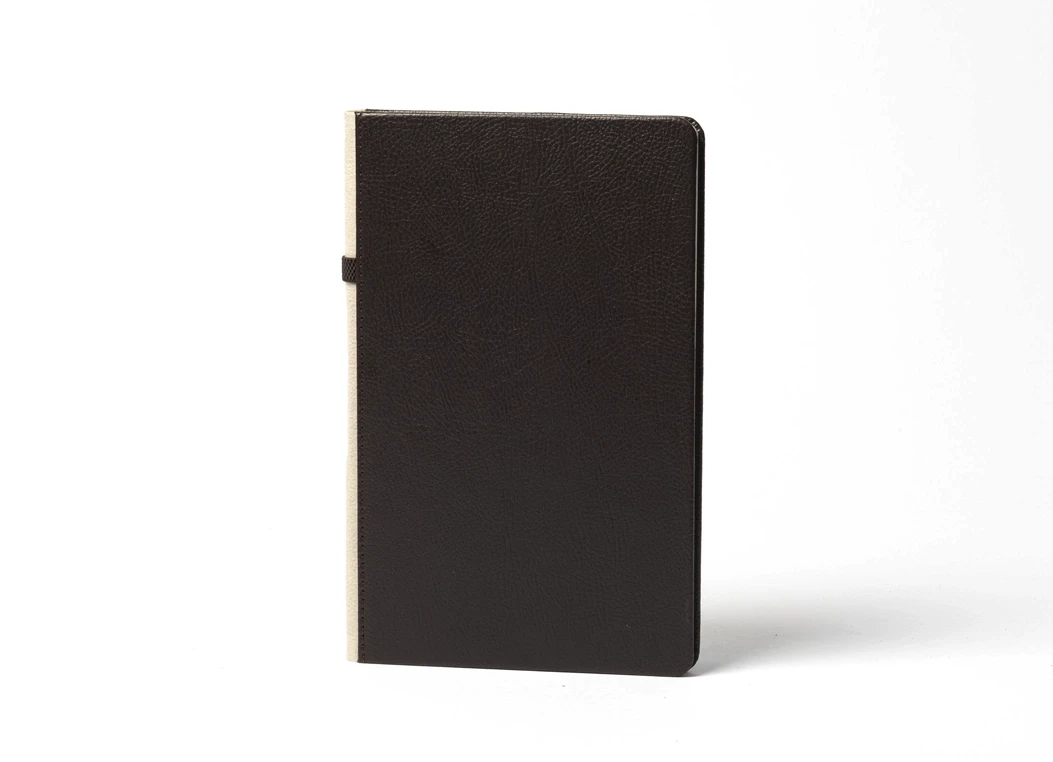 Front view of minimalist leather journal with rounded corners
