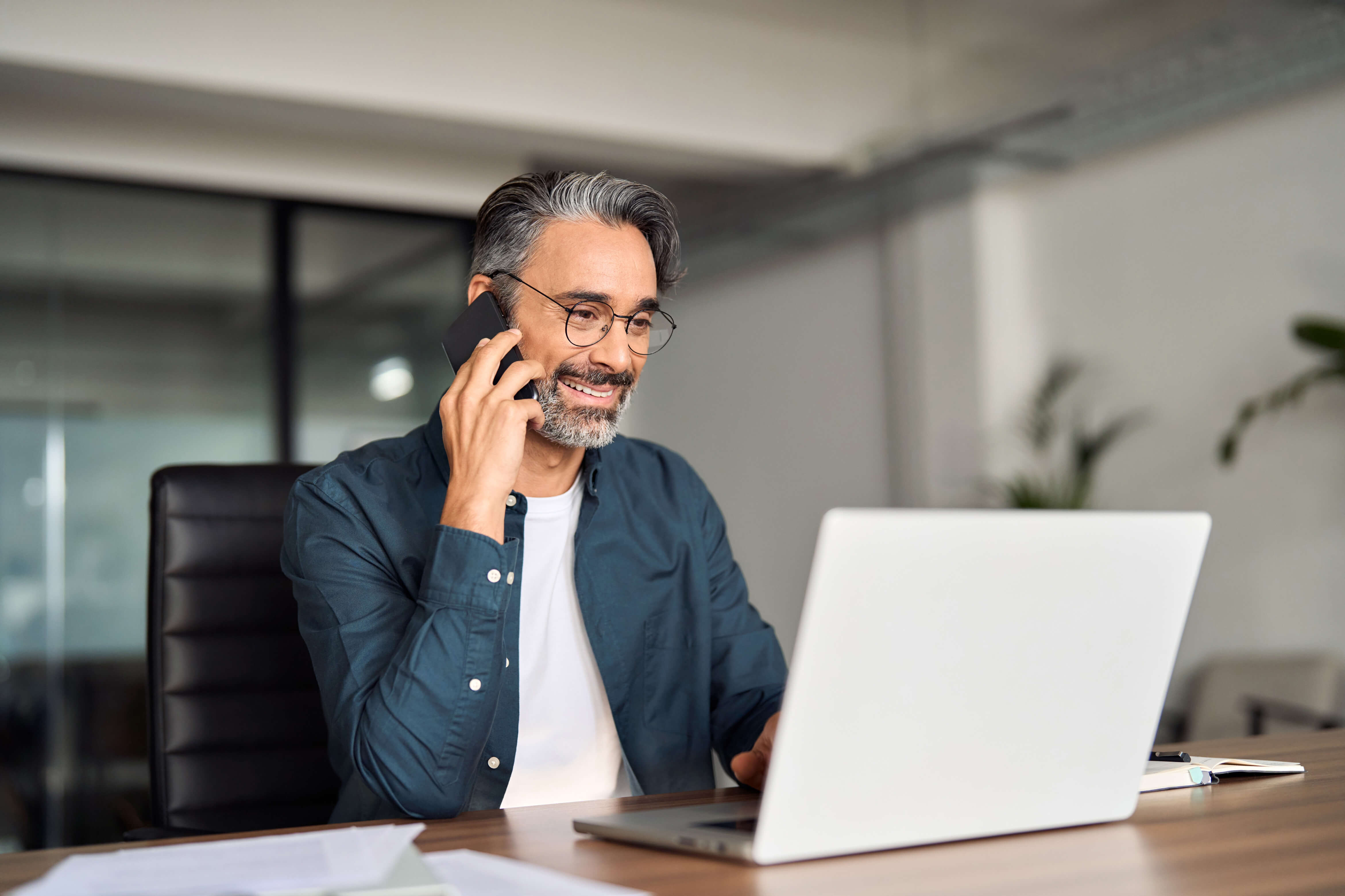 business man working on laptop for financial solutions