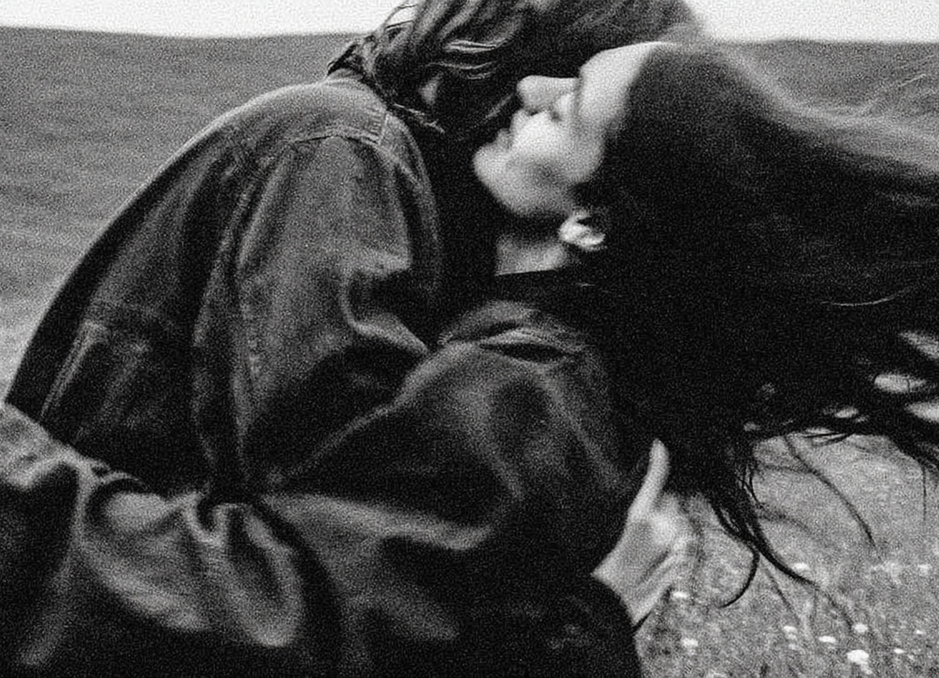 Woman posing in a black sports outfit.