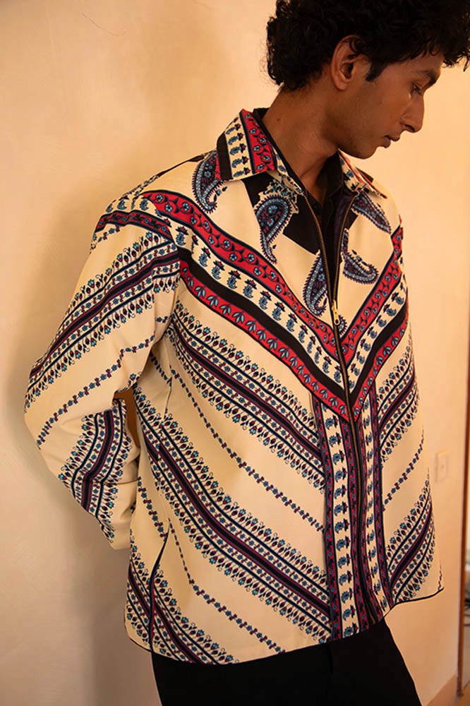 Aksa Bomber IV is our one-of-a-kind printed silk bomber jacket, handcrafted by skilled artisans in-house using a one-of-a-kind vintage silk saree.