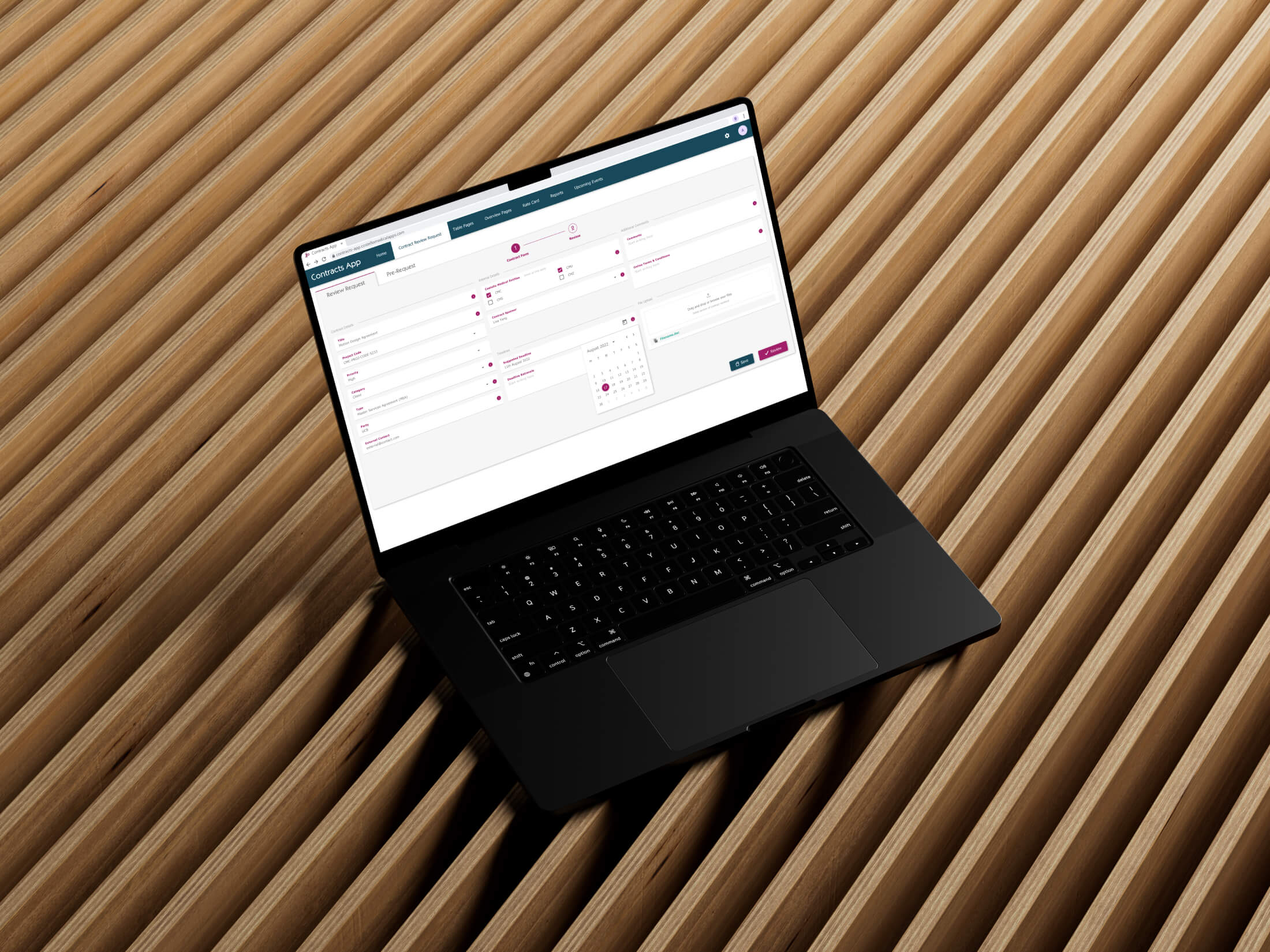 Contract management app Contract Review Request laptop on wooden slats