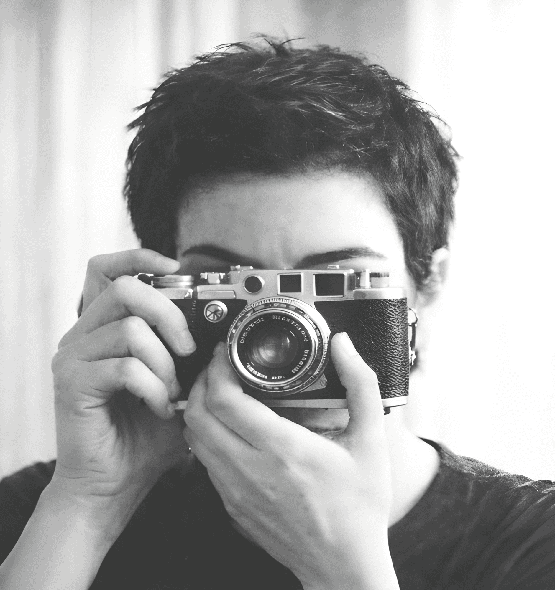 Photographer holding camera