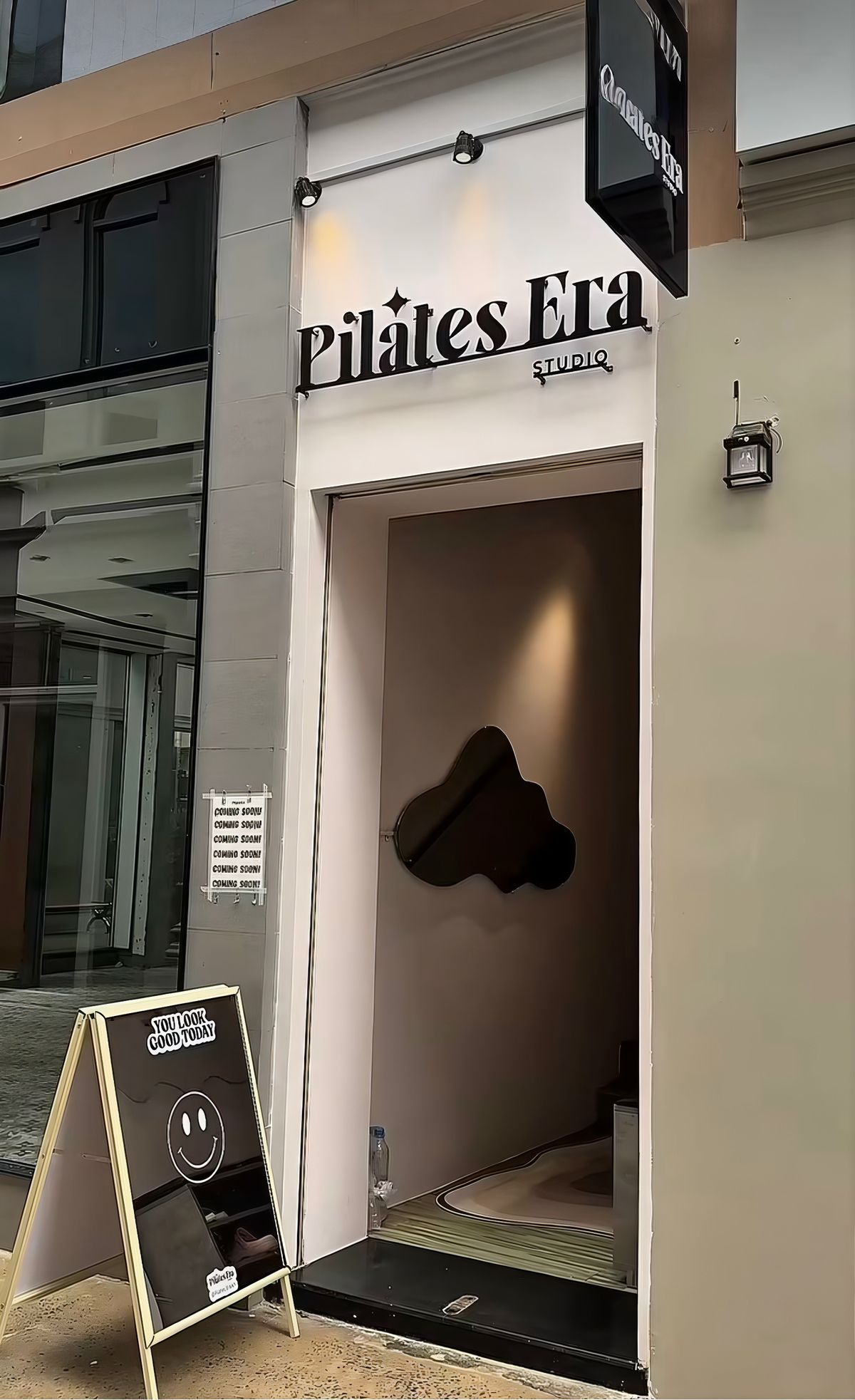 Metal Sign called Fuse Pilates Studio in reception 