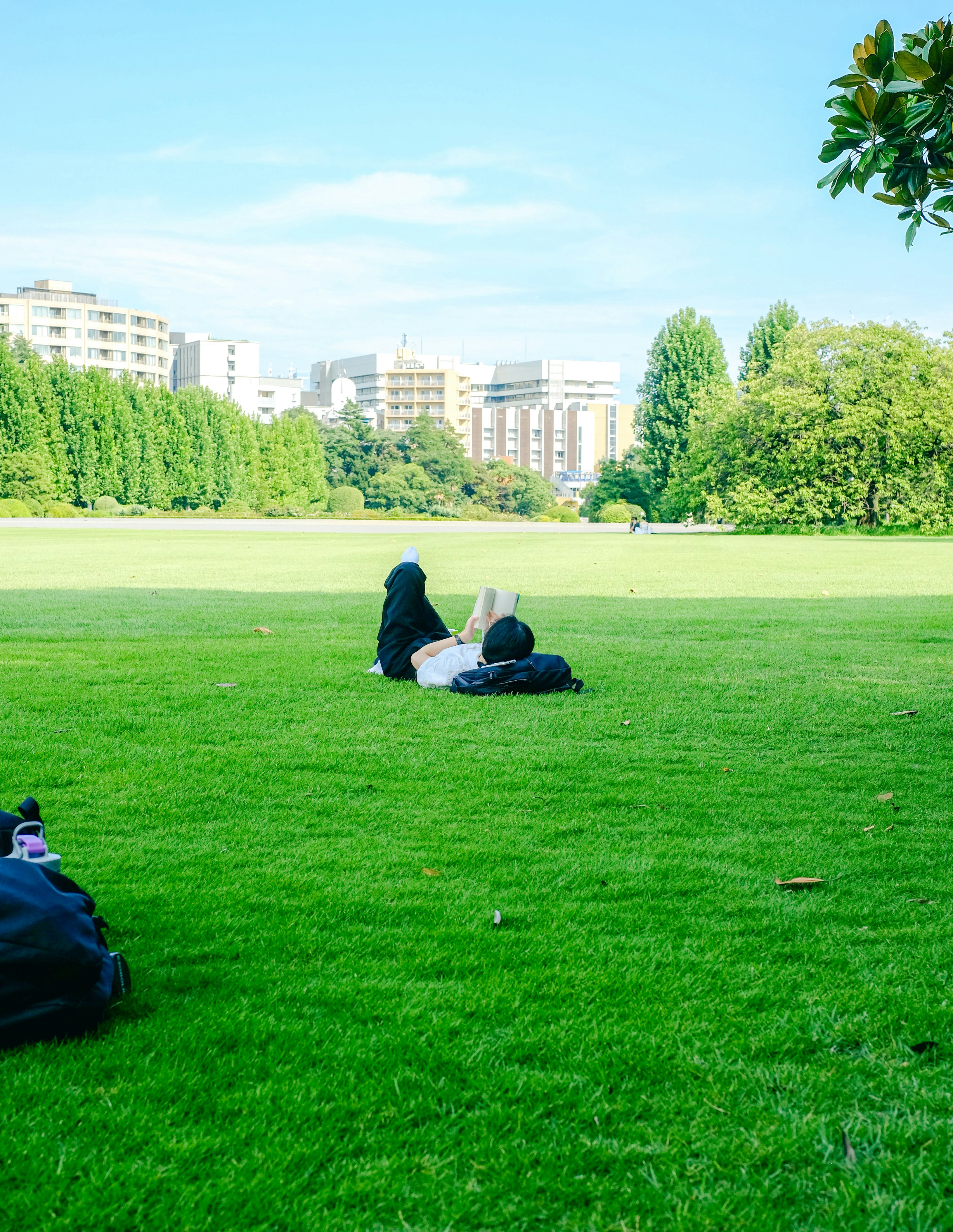A smiling woman throwing a basketball