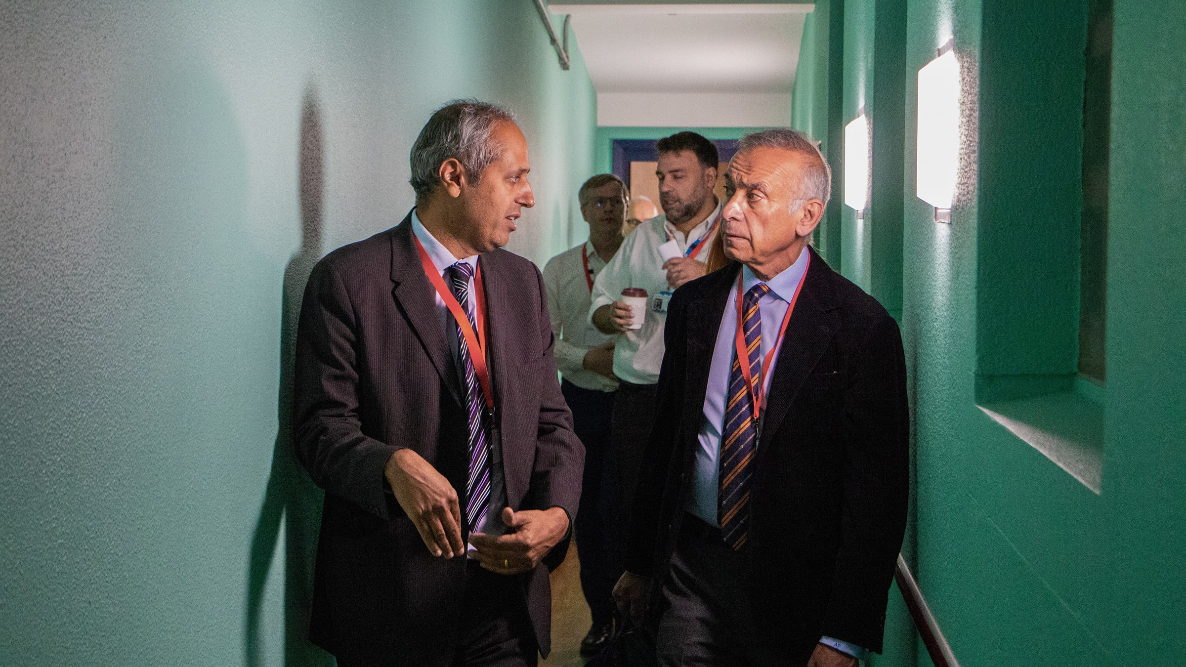 Lord Darzi being given a tour of a police station as part of his report into the NHS