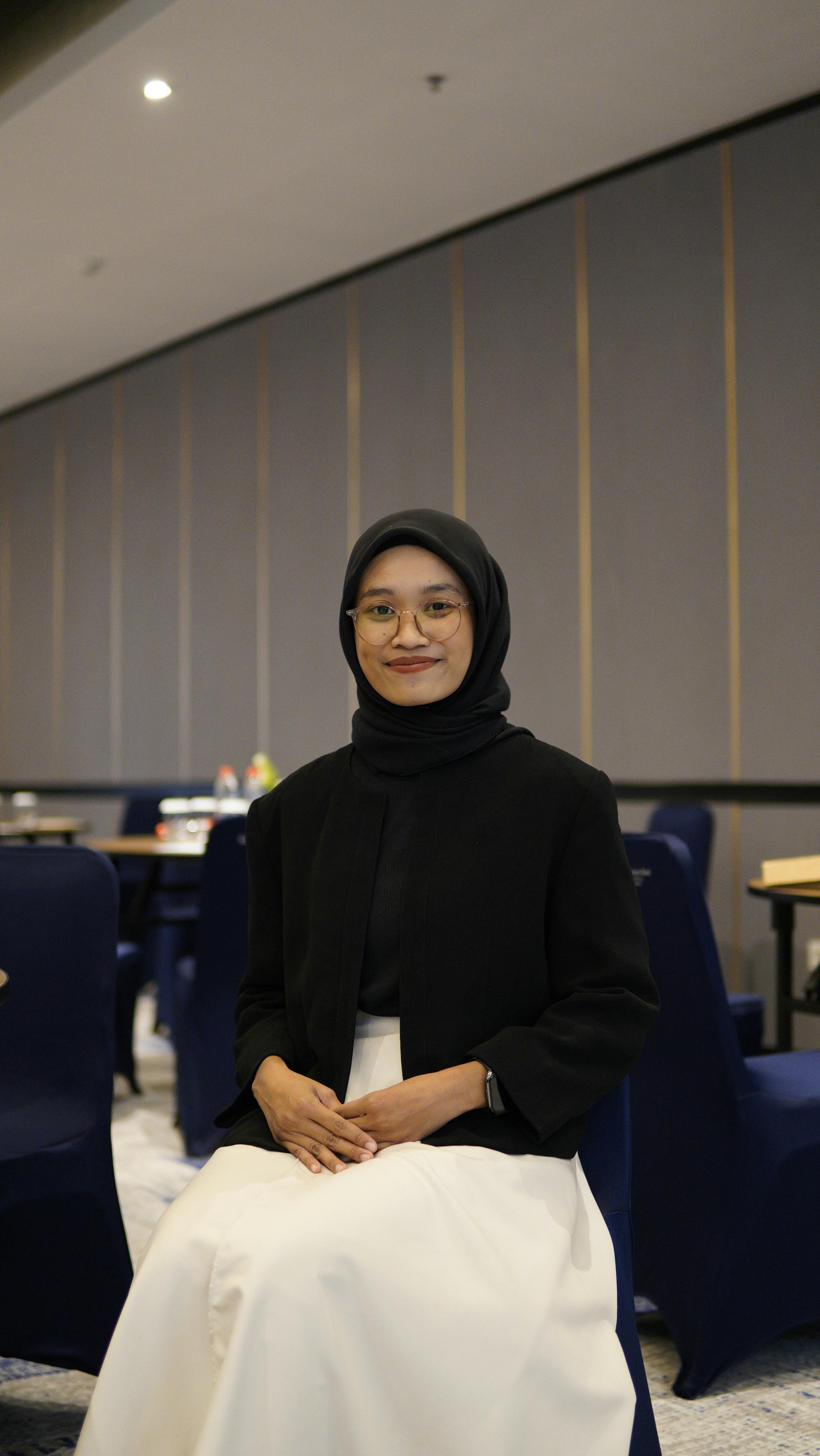 woman in white and blue checked dress shirt