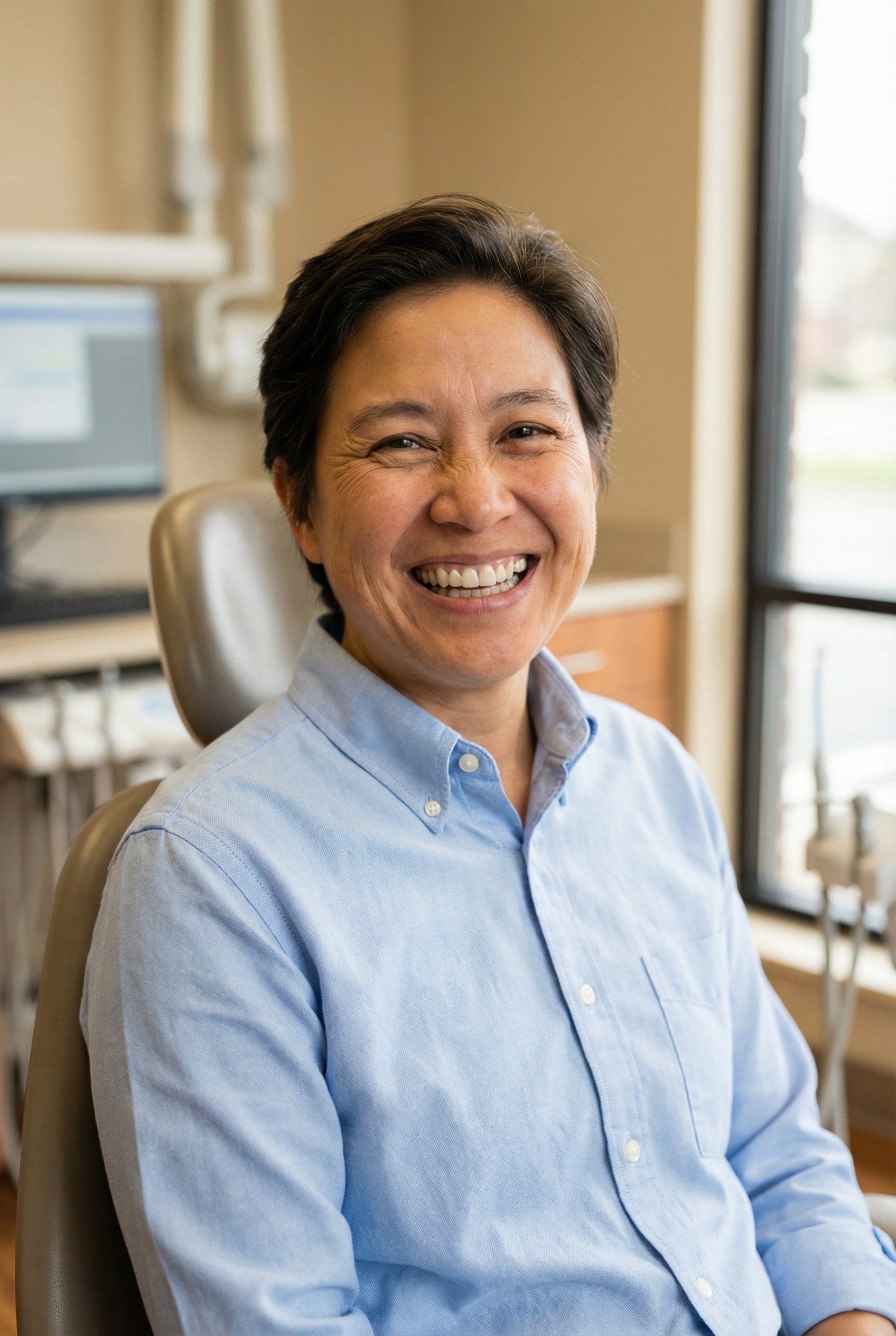 Skilled dentist permanently cementing CEREC crown onto prepared tooth with precision and expertise