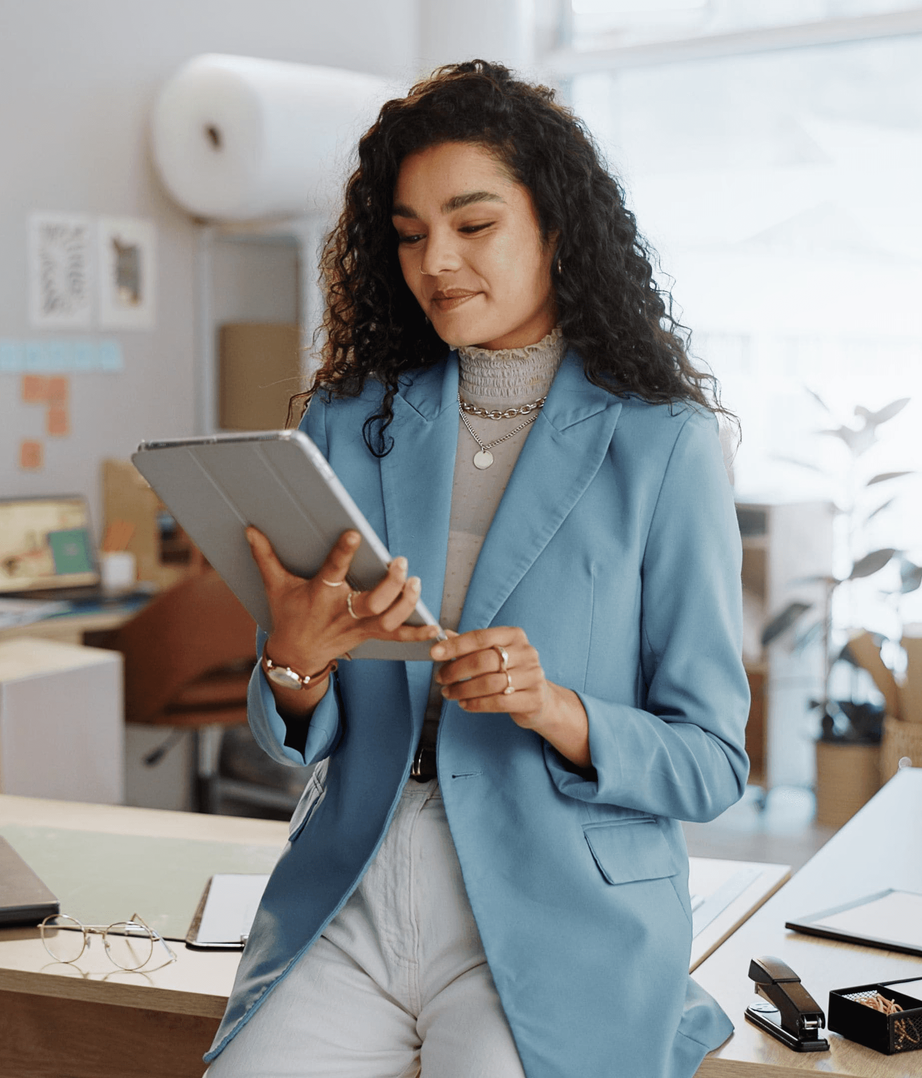 Small Business owner looking at a tablet