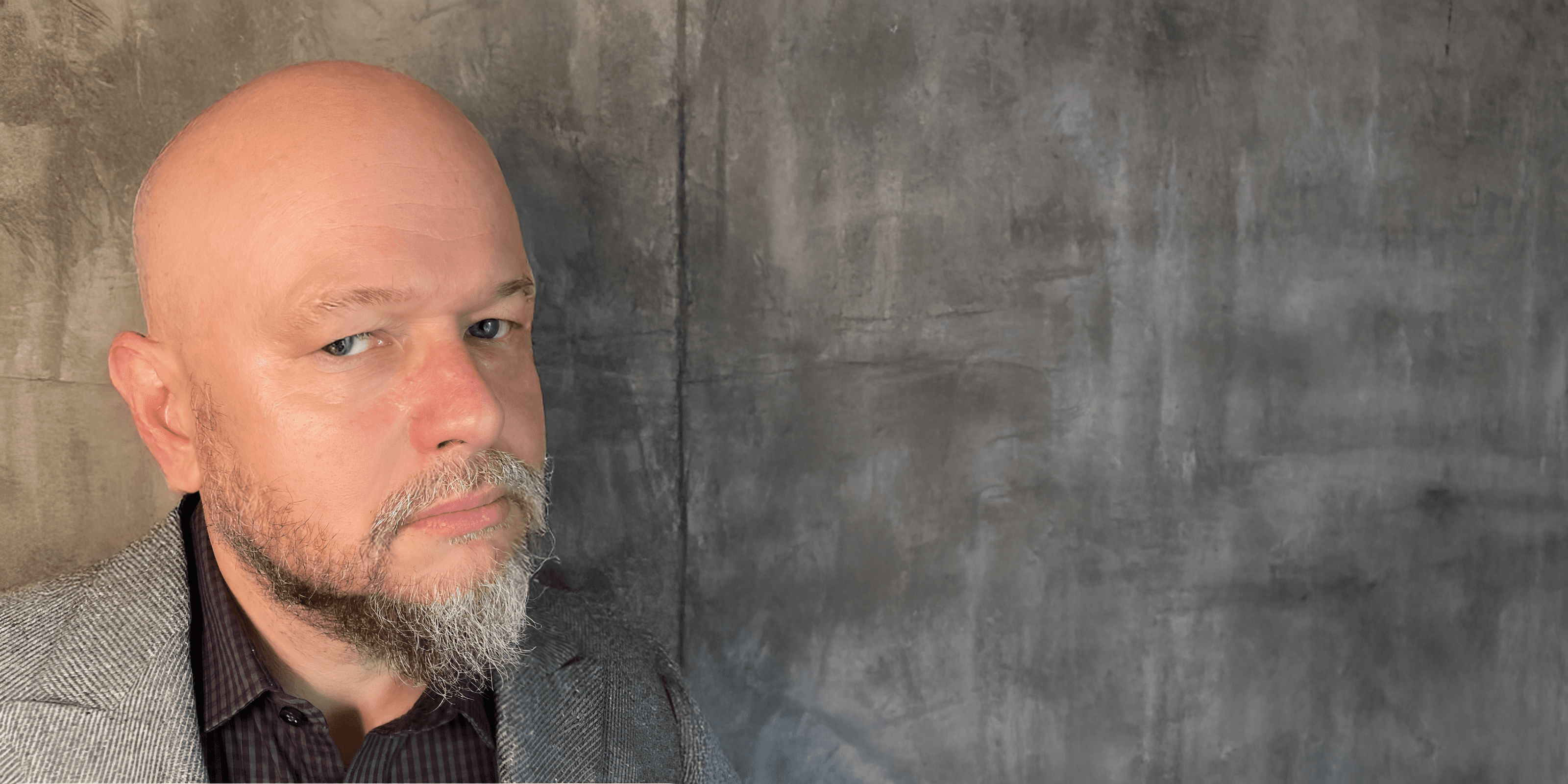 Photo of Chuck Wyatt from the wIaist up looking forward.