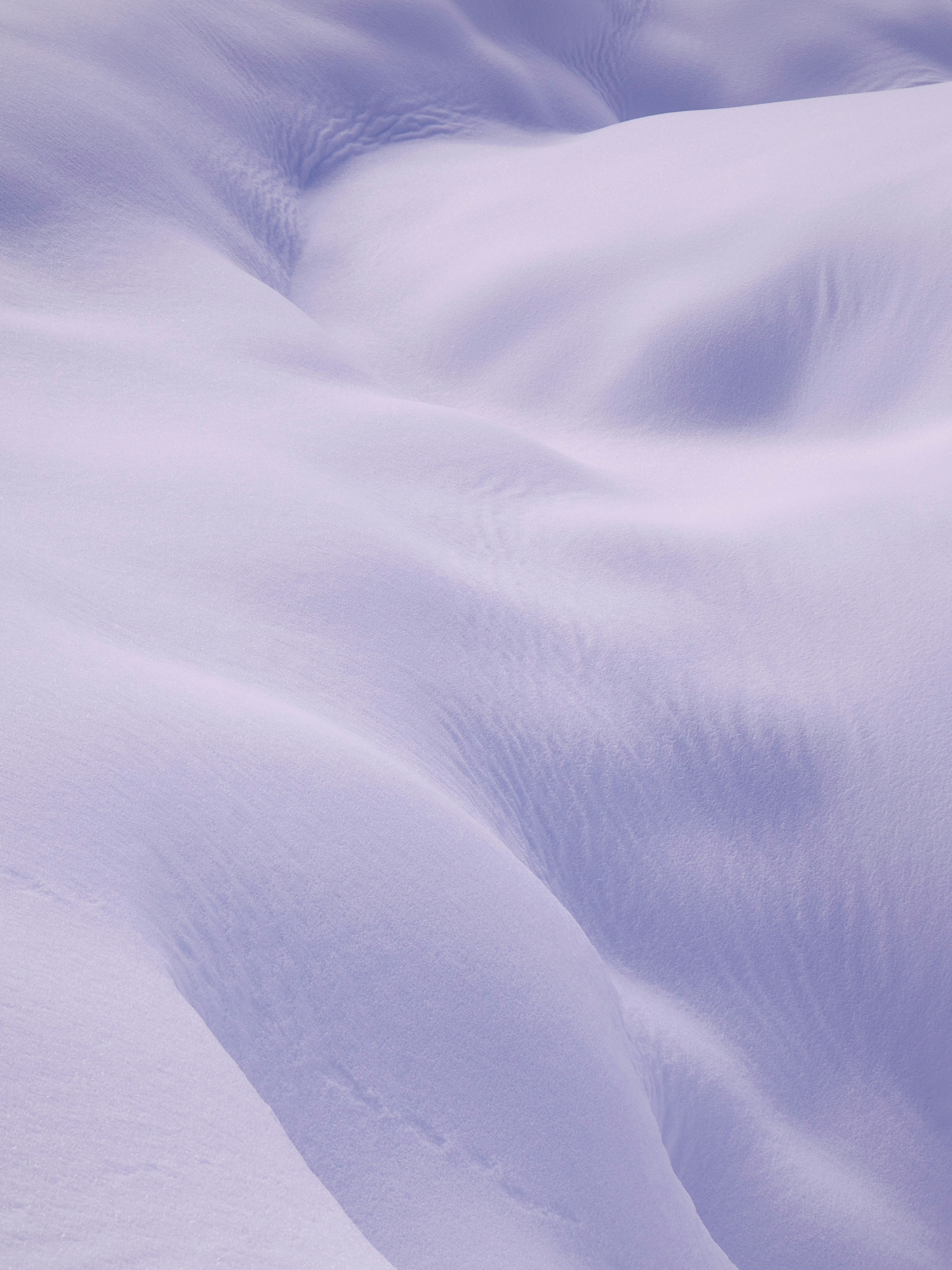 a person skiing down a snow covered slope