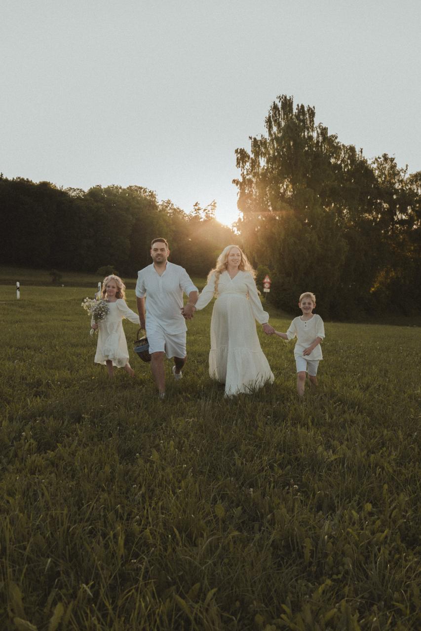 Fashion photoshoot with a woman posing in a dress