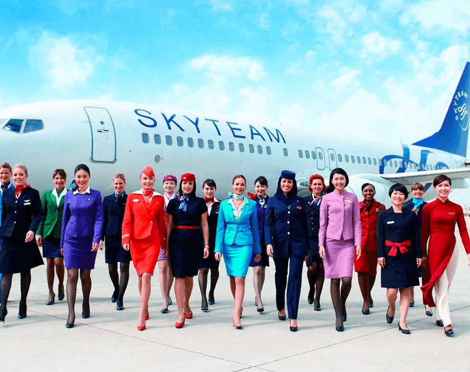 Skyteam staff in front of an airplane