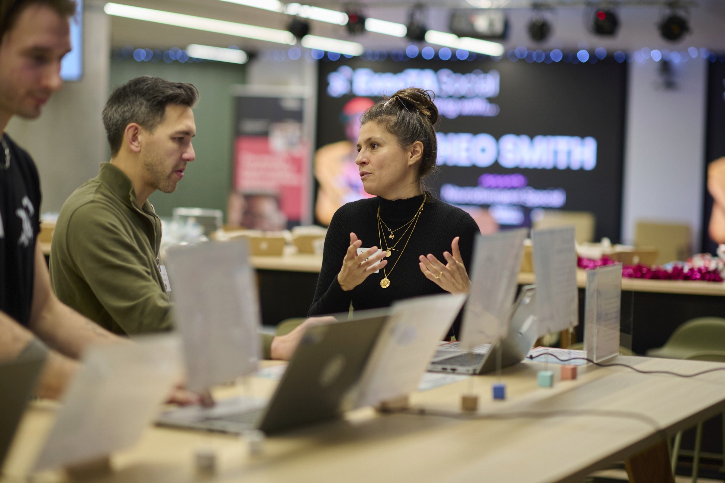 Deni explaing the different excersises available at the lab