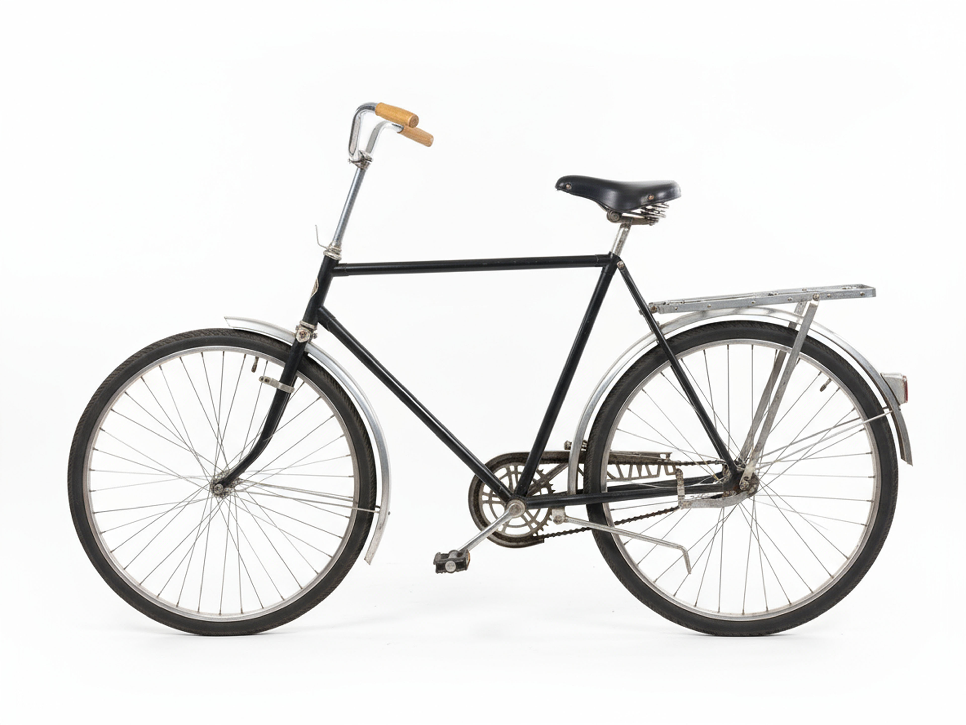 Klassisk svart herrcykel – hållbar begagnad cykel i retrostil, servad och klar hos cykelverkstad i Uppsala.