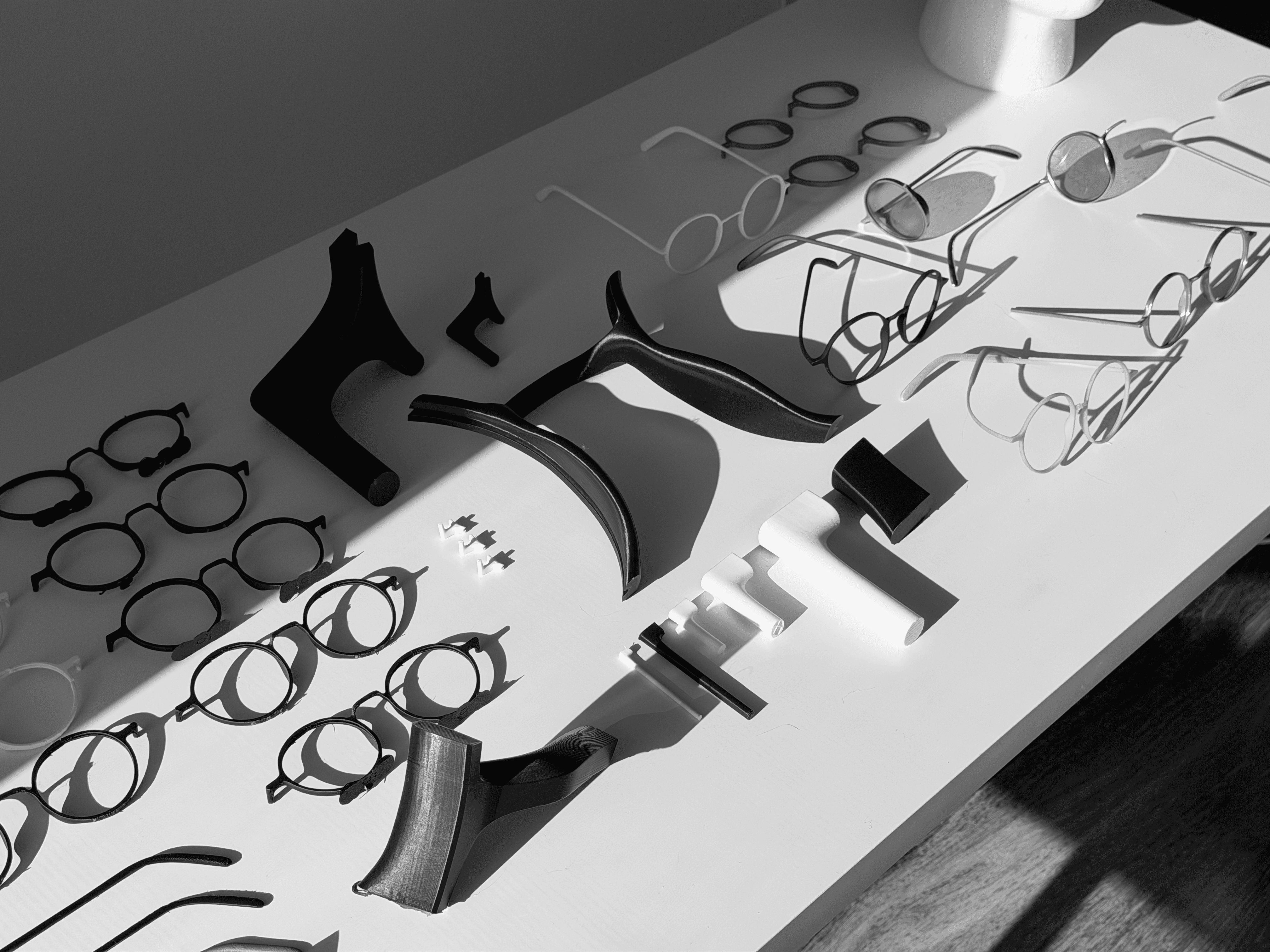Streetside billboard with flyposters of the Batch.Works brand and illustrations