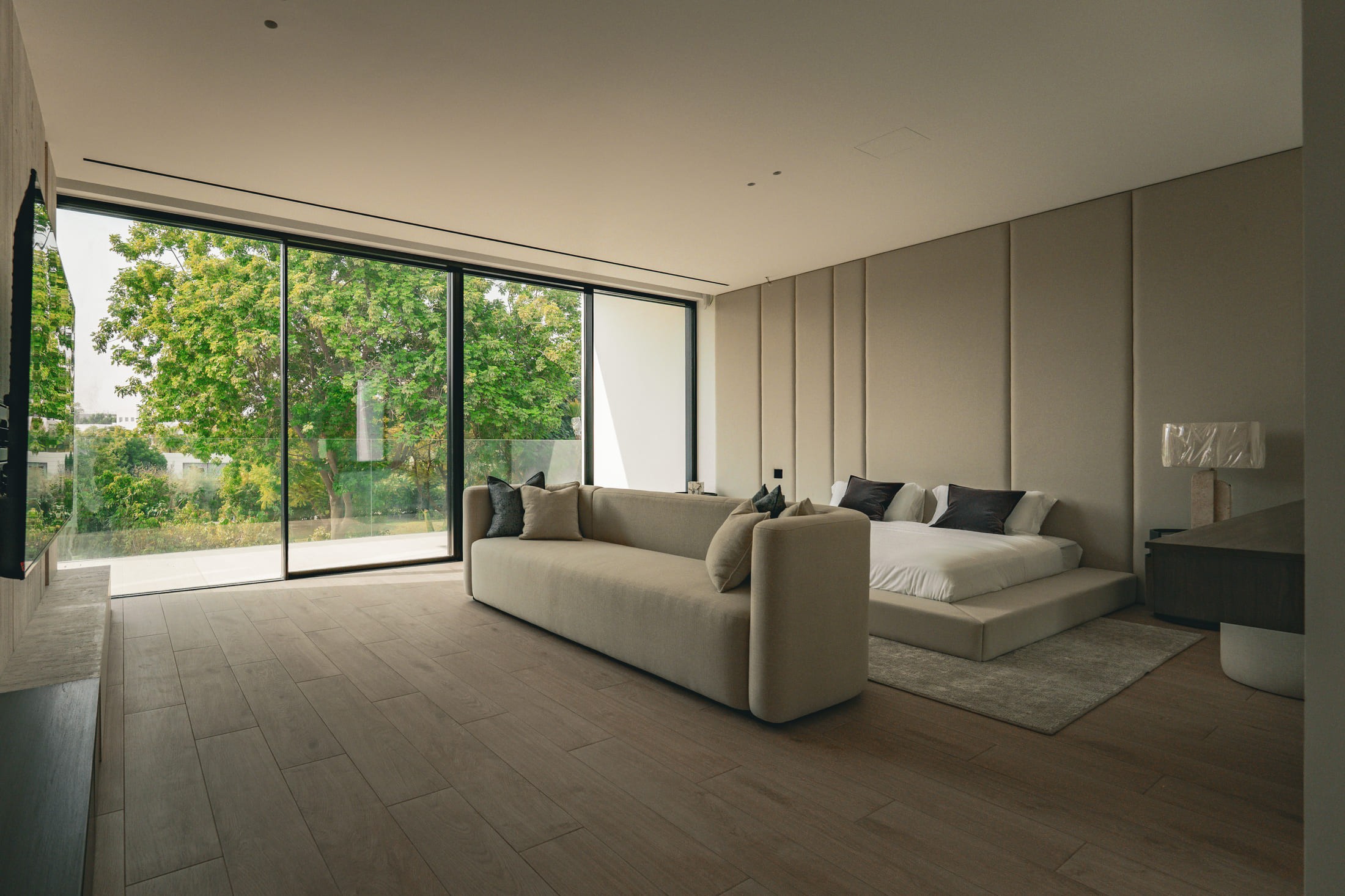 Image of a large villa with big glass windows