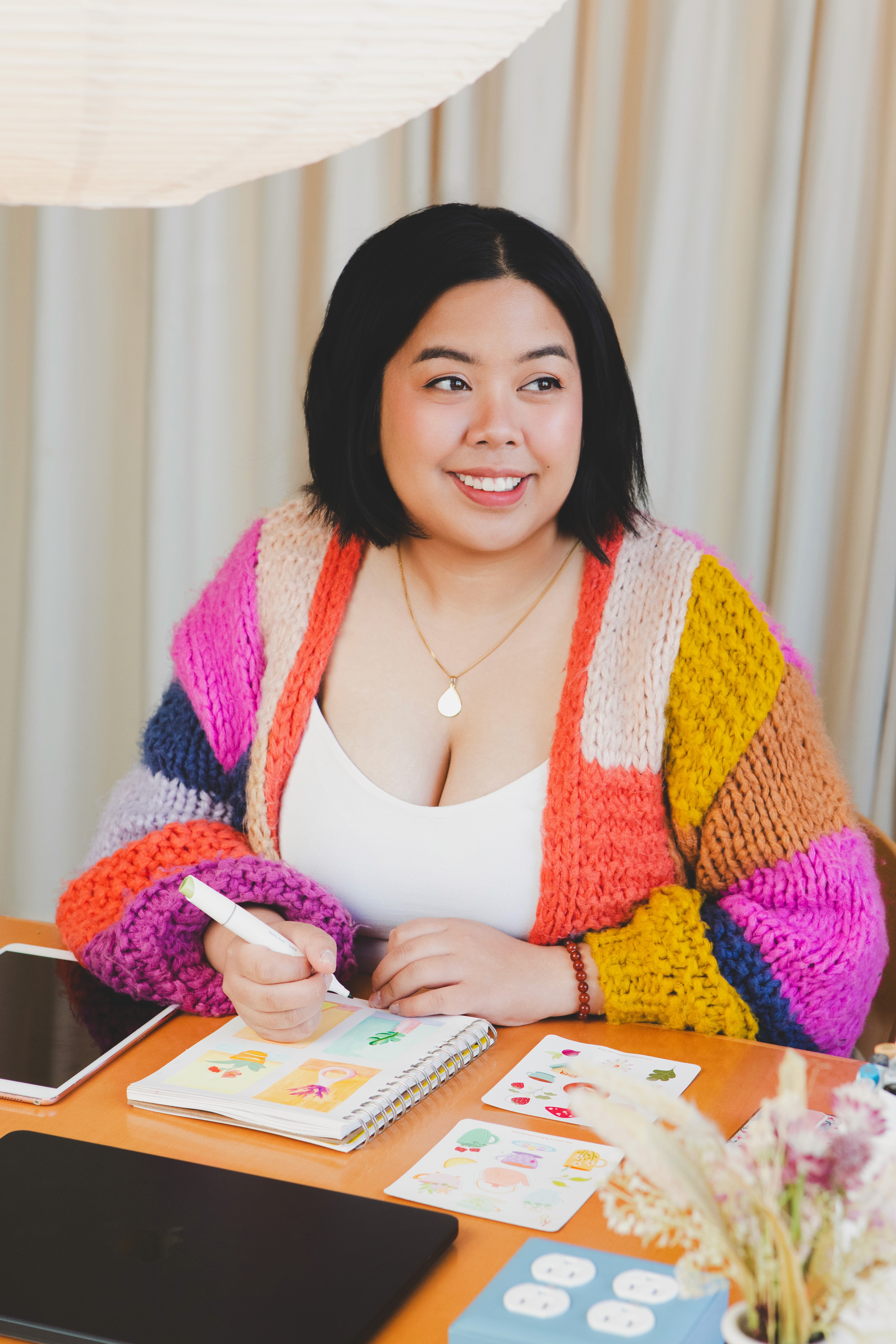 Designer colouring in sketchbook