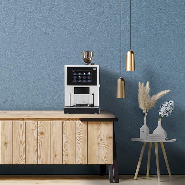 White coffee machine on wooden cabinet in modern office setting
