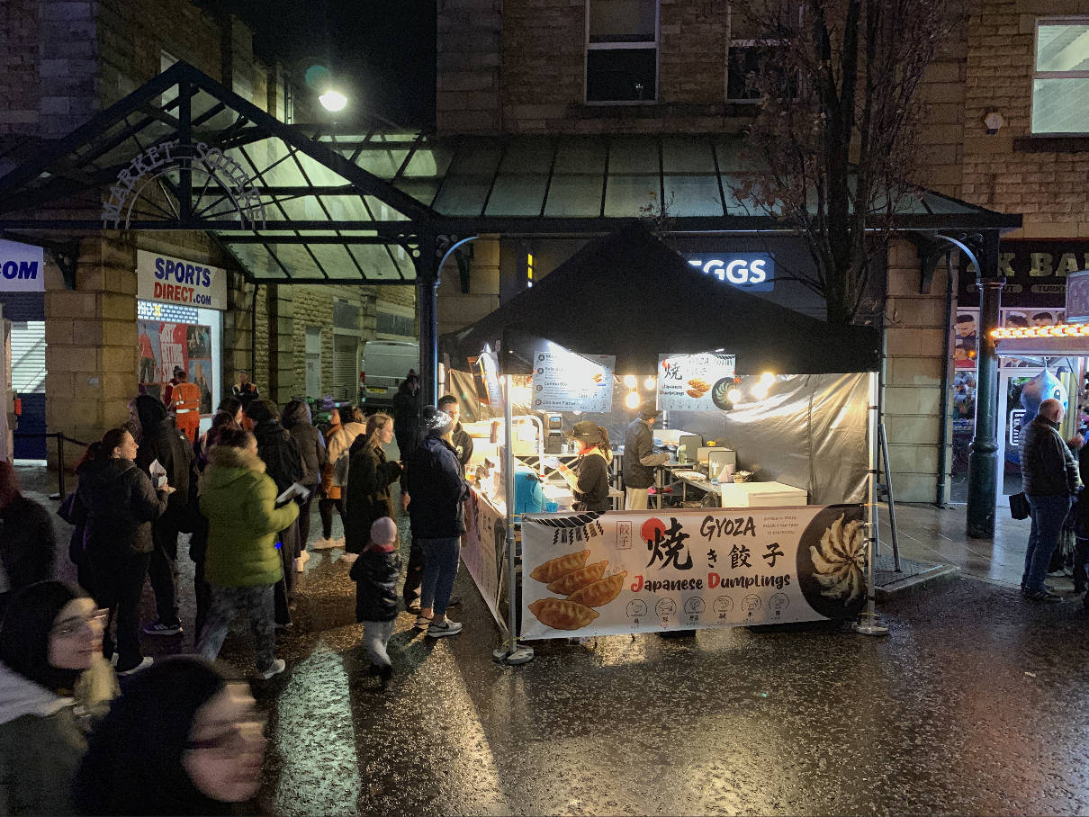 Minimalist coffee can design in hand – black and white packaging with bold typography