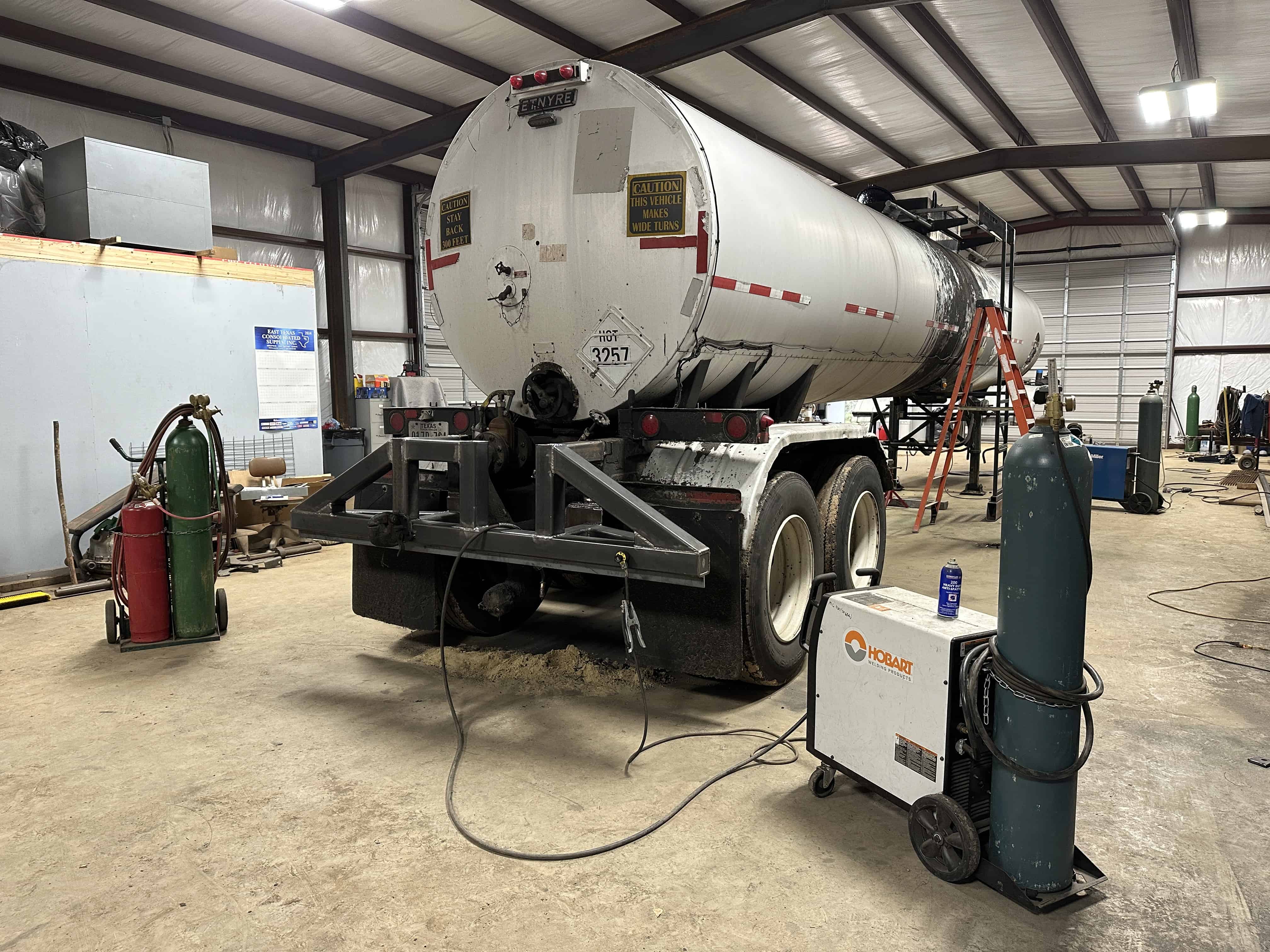 This picture shows our Hobart MIG welder being used to weld the steel tubing bumper for the 18 wheeler trailer.  MIG welding services were used on this project in Henderson, Texas.